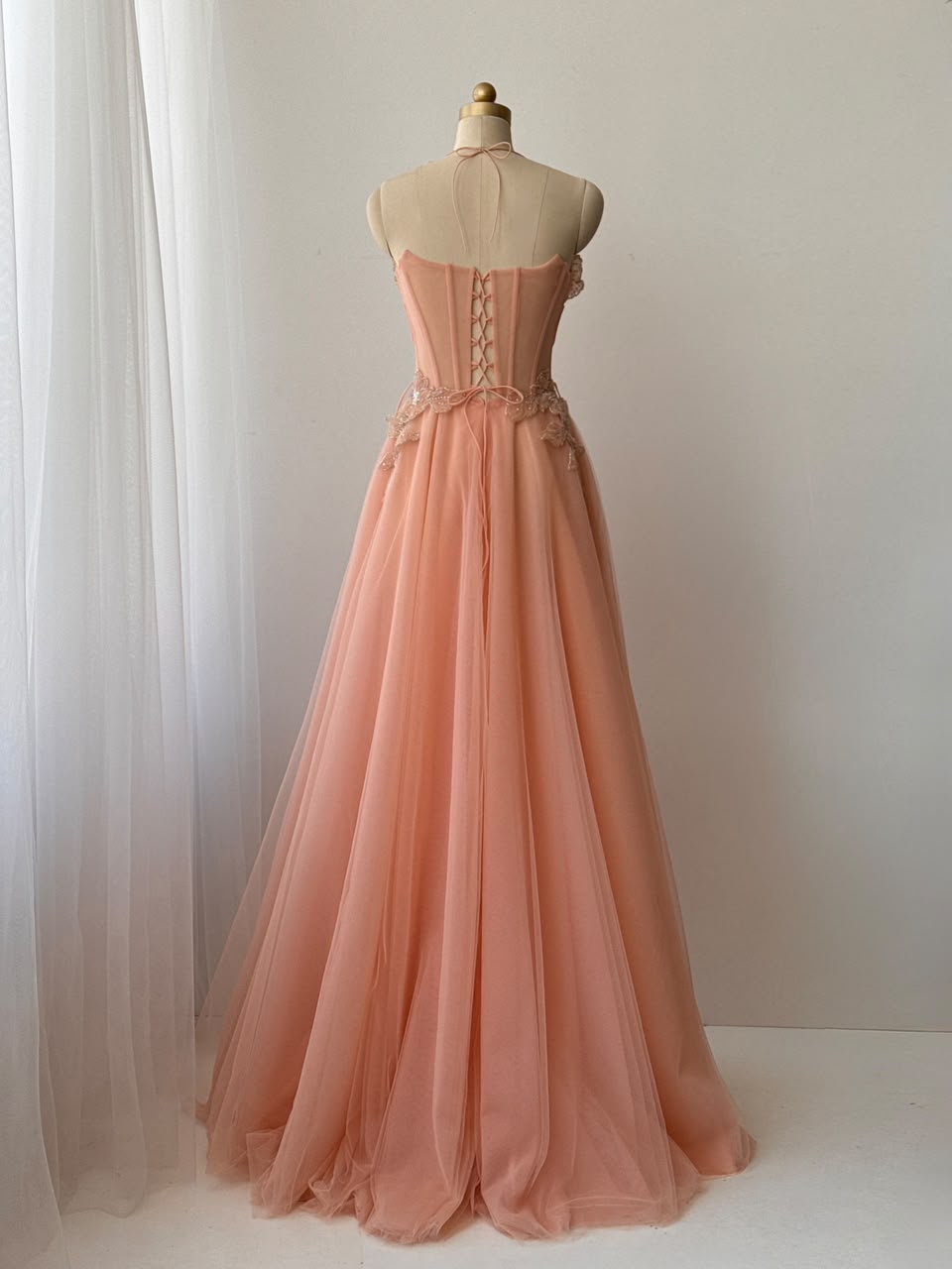 Peach A-Line gown with straps and embroidery