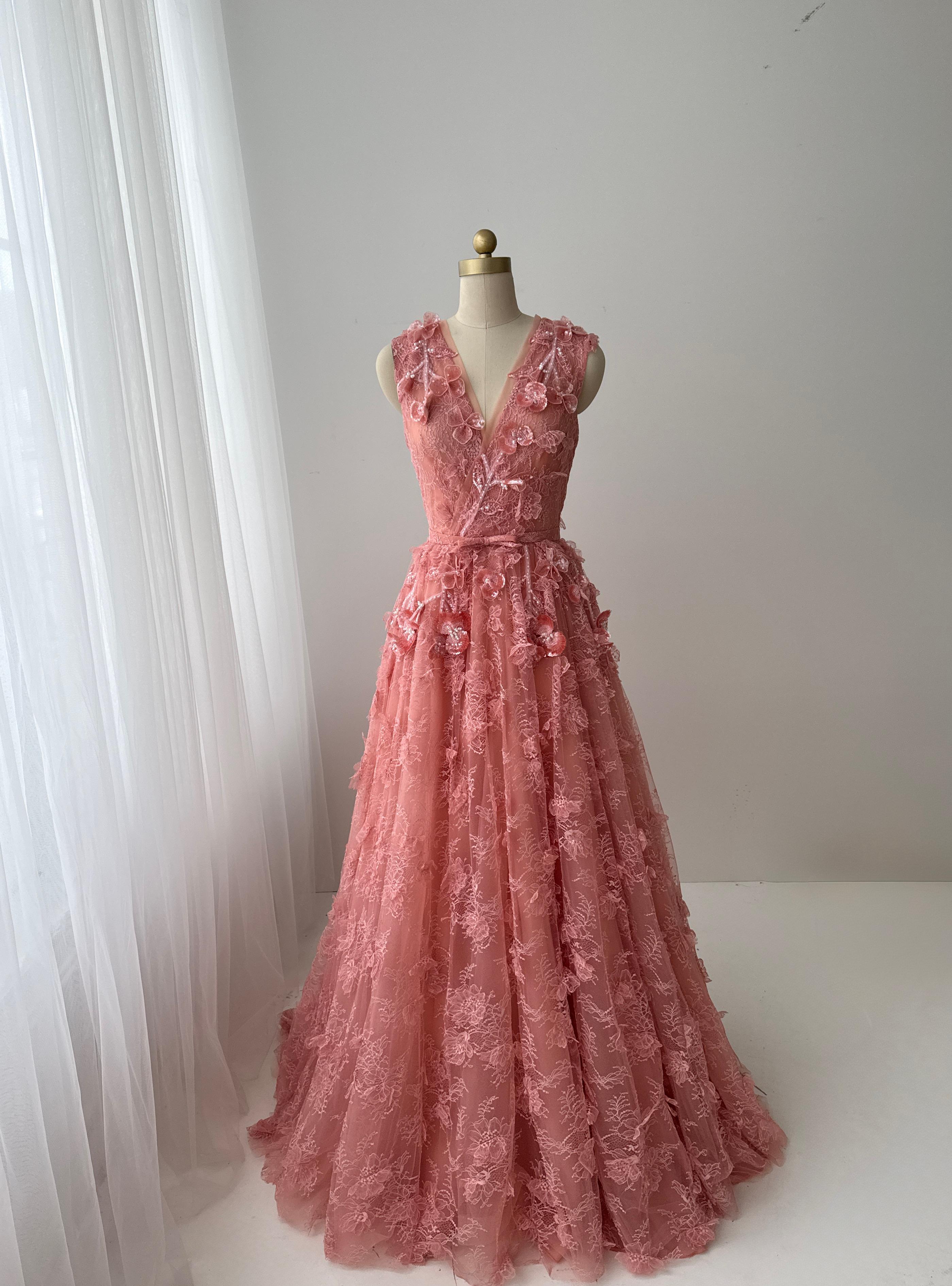 Pink A-Line gown with v-neck, embroidery and no sleeves