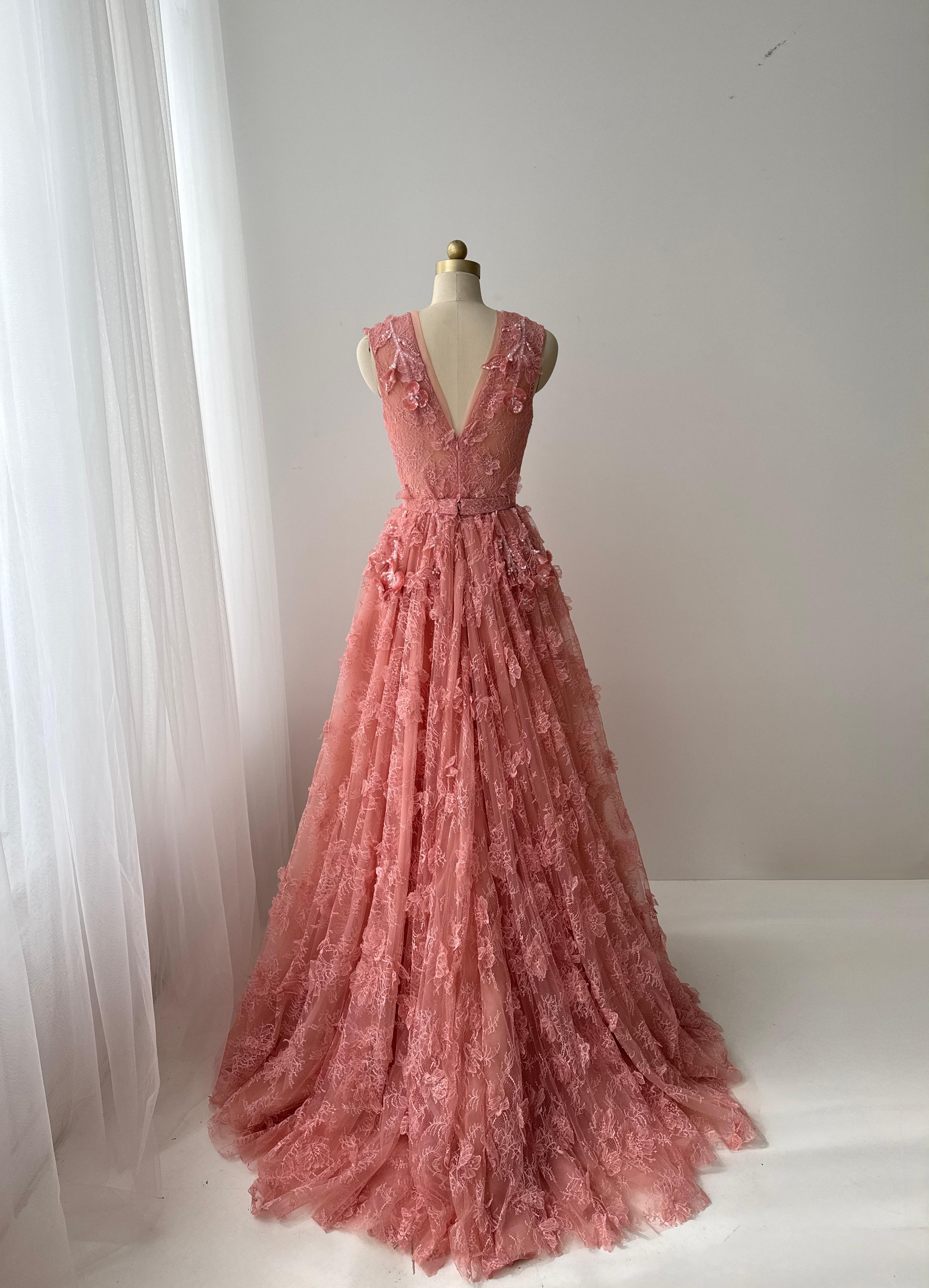 Pink A-Line gown with v-neck, embroidery and no sleeves