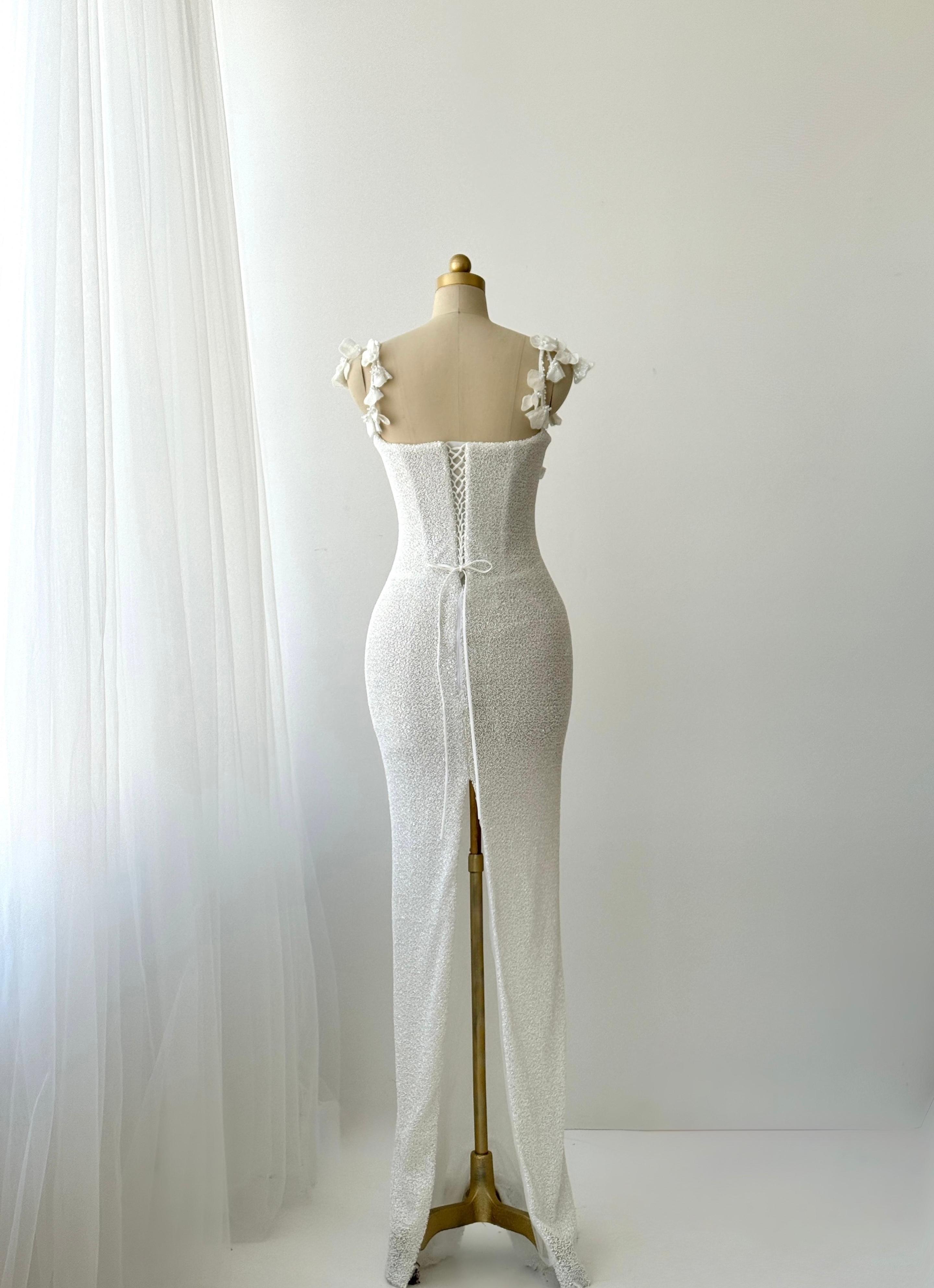 White Mermaid bridal gown with spaghetti straps and embroidery