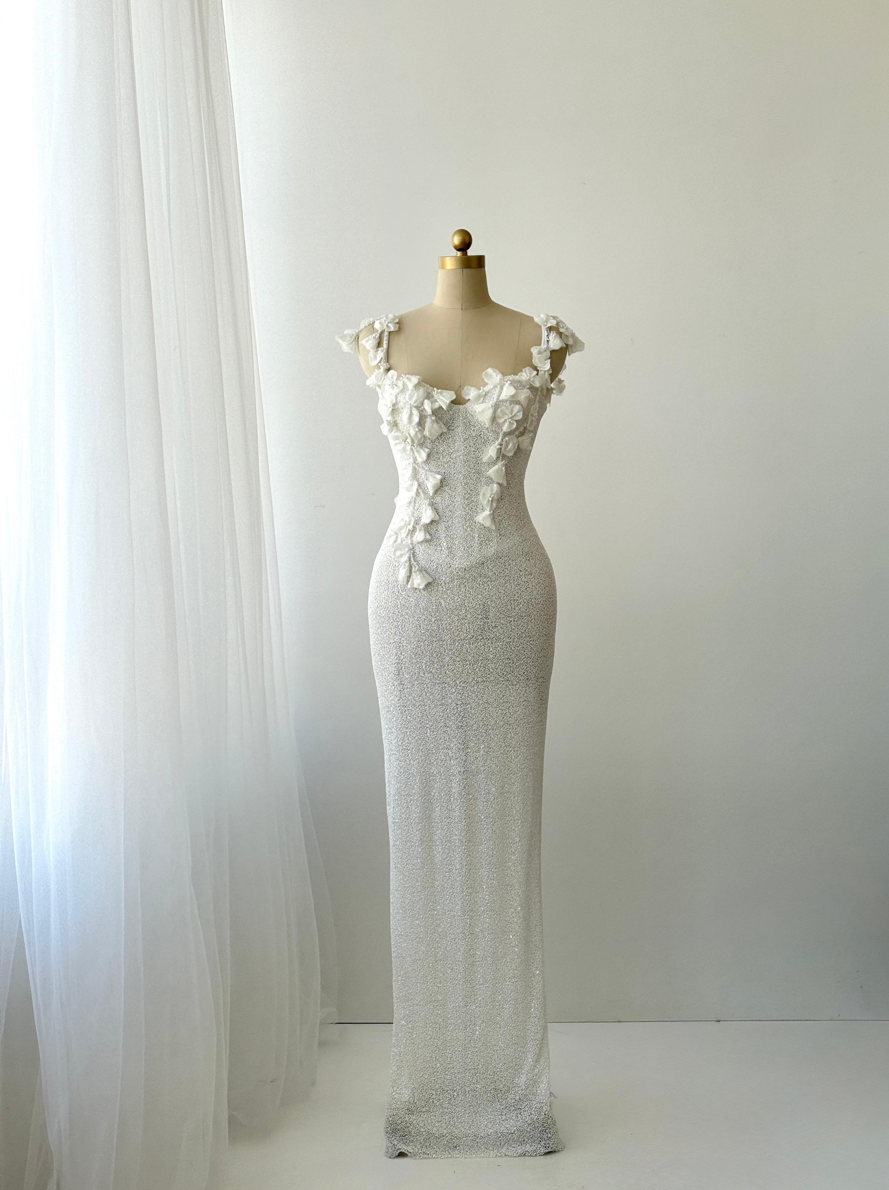 White Mermaid bridal gown with spaghetti straps and embroidery