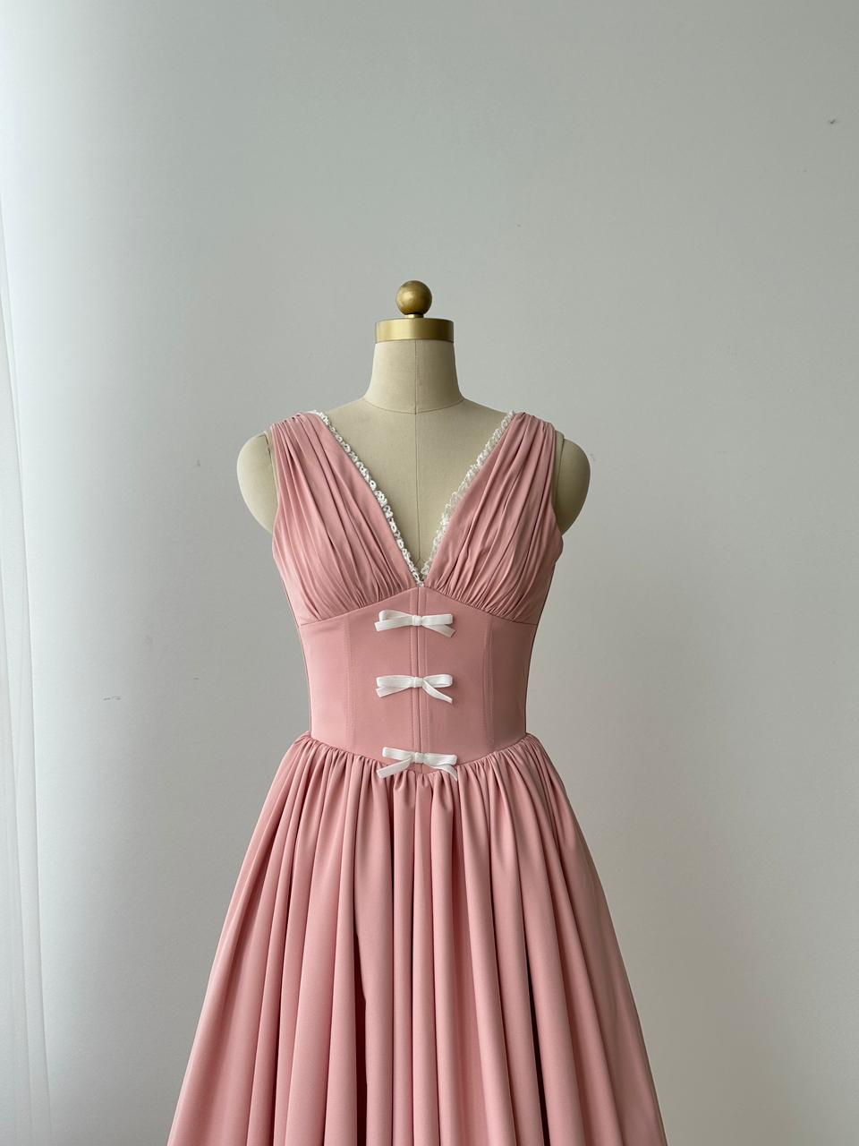 Pink midi dress with embroidered bows, lace and no sleeves