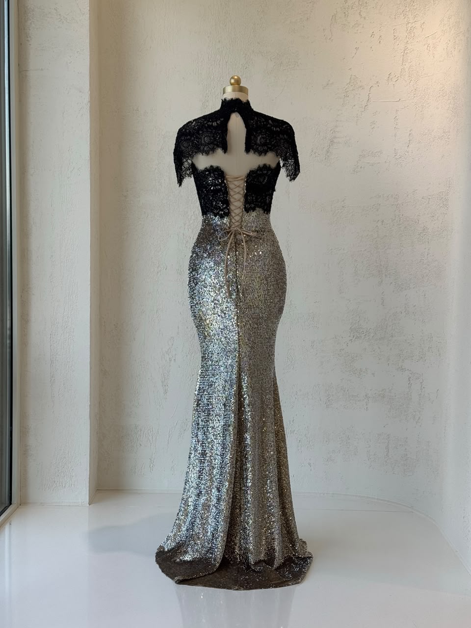 Black and grey mermaid gown with lace, sequins, embroidered bows and bolero