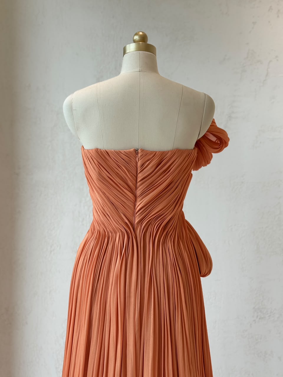 Orange A-Line gown with embroider, draped fabric and no sleeves