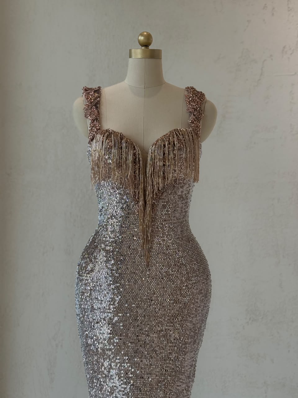 Rose gold mermaid gown with fringes, sequins, straps and embroidery