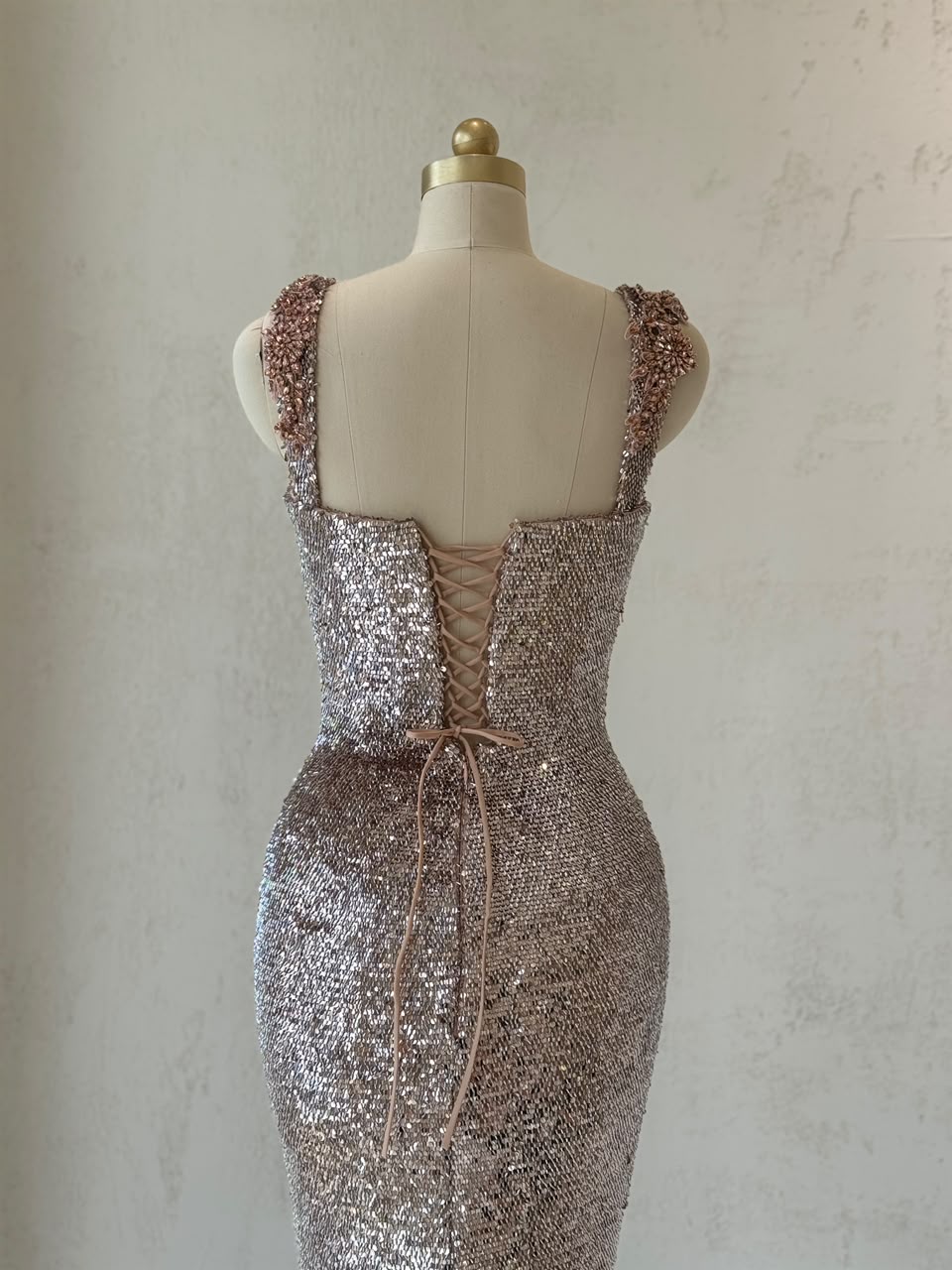 Rose gold mermaid gown with fringes, sequins, straps and embroidery