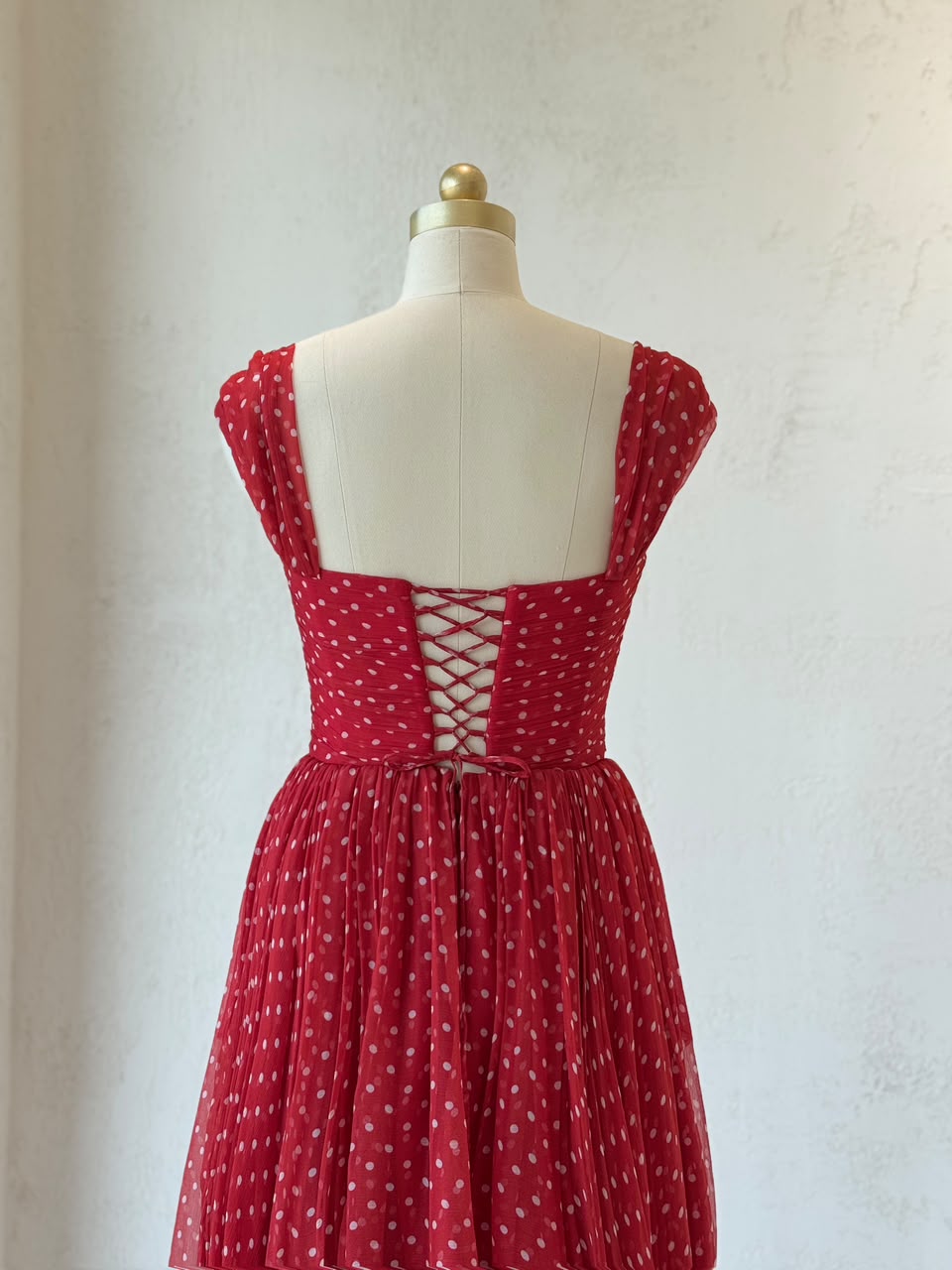 Red midi dress with straps and tulle dotted fabric