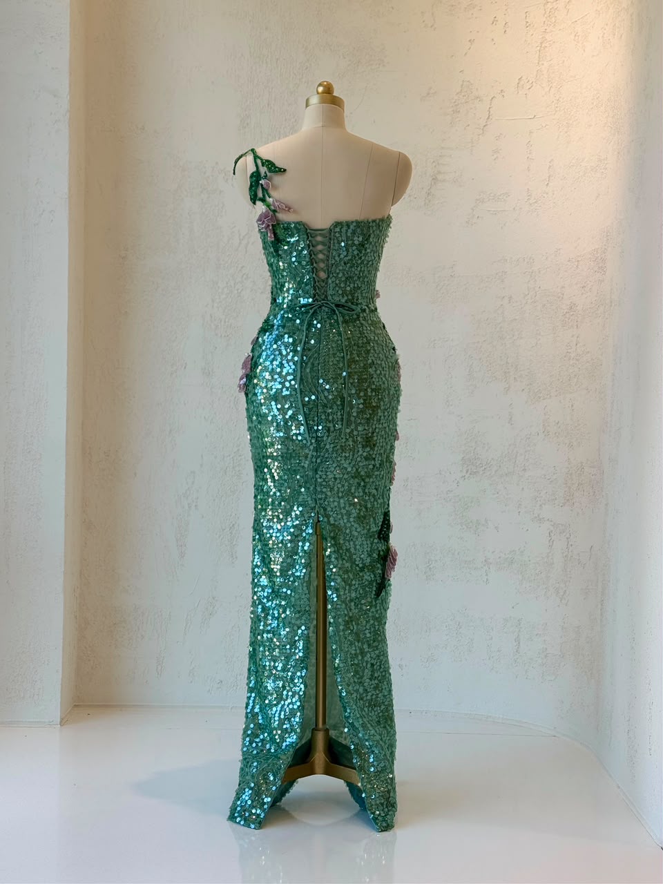 Green mermaid gown with one shoulder strap, sequins and embroidery