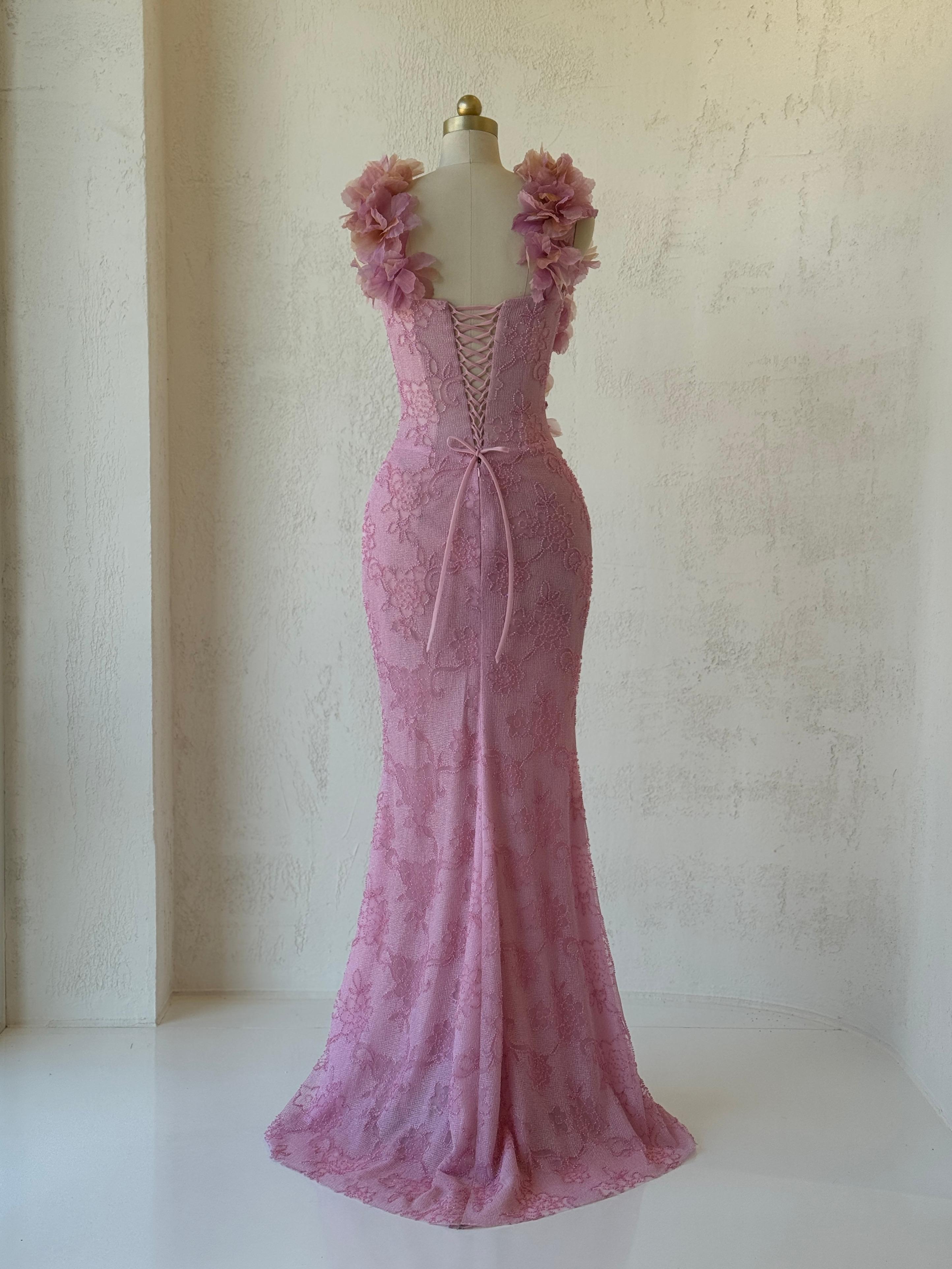 Pink mermaid gown with straps, floral embroidery and bow
