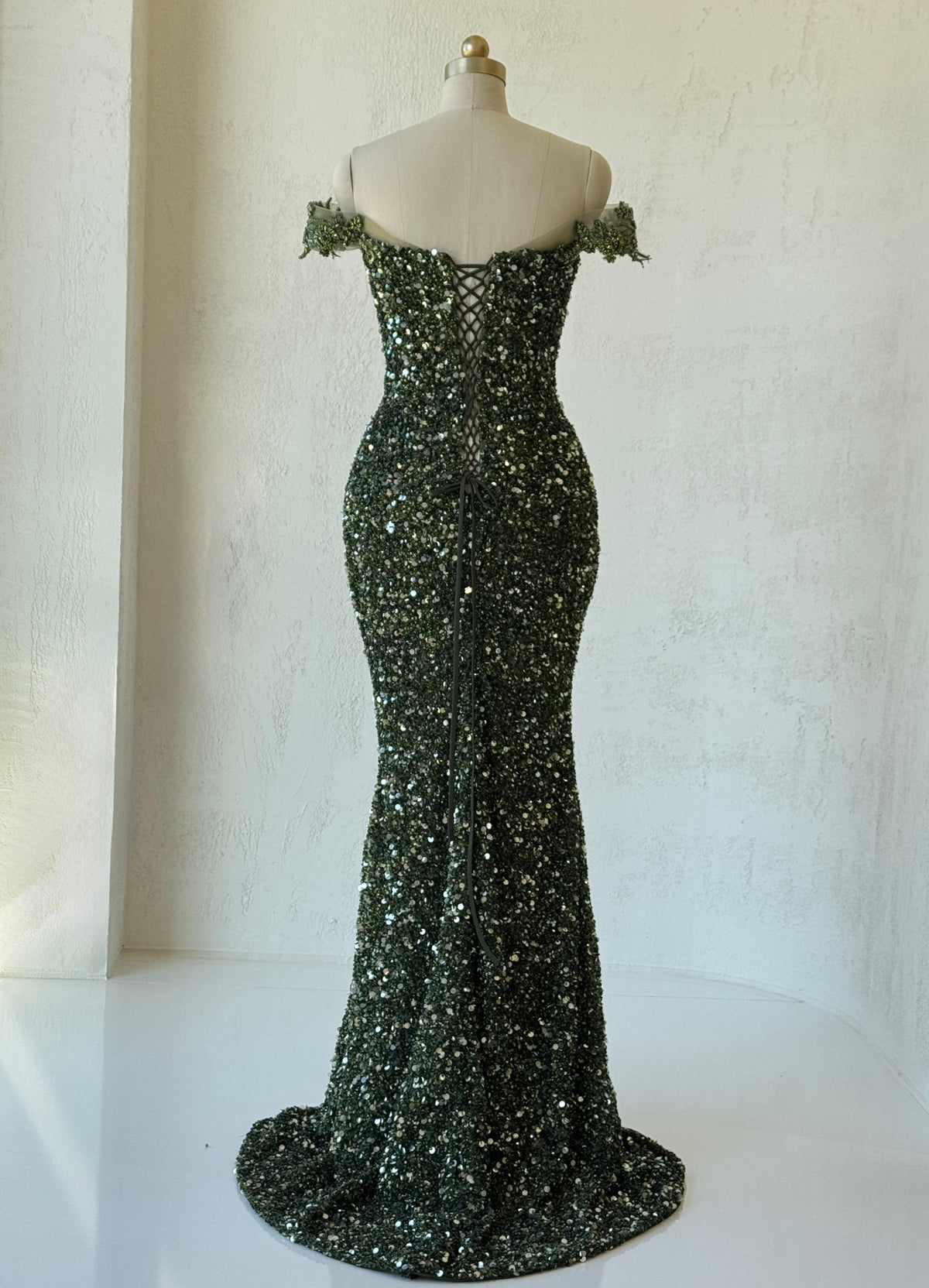 Green mermaid gown with off the shoulder sleeves, v-neck, embroidery and sequins