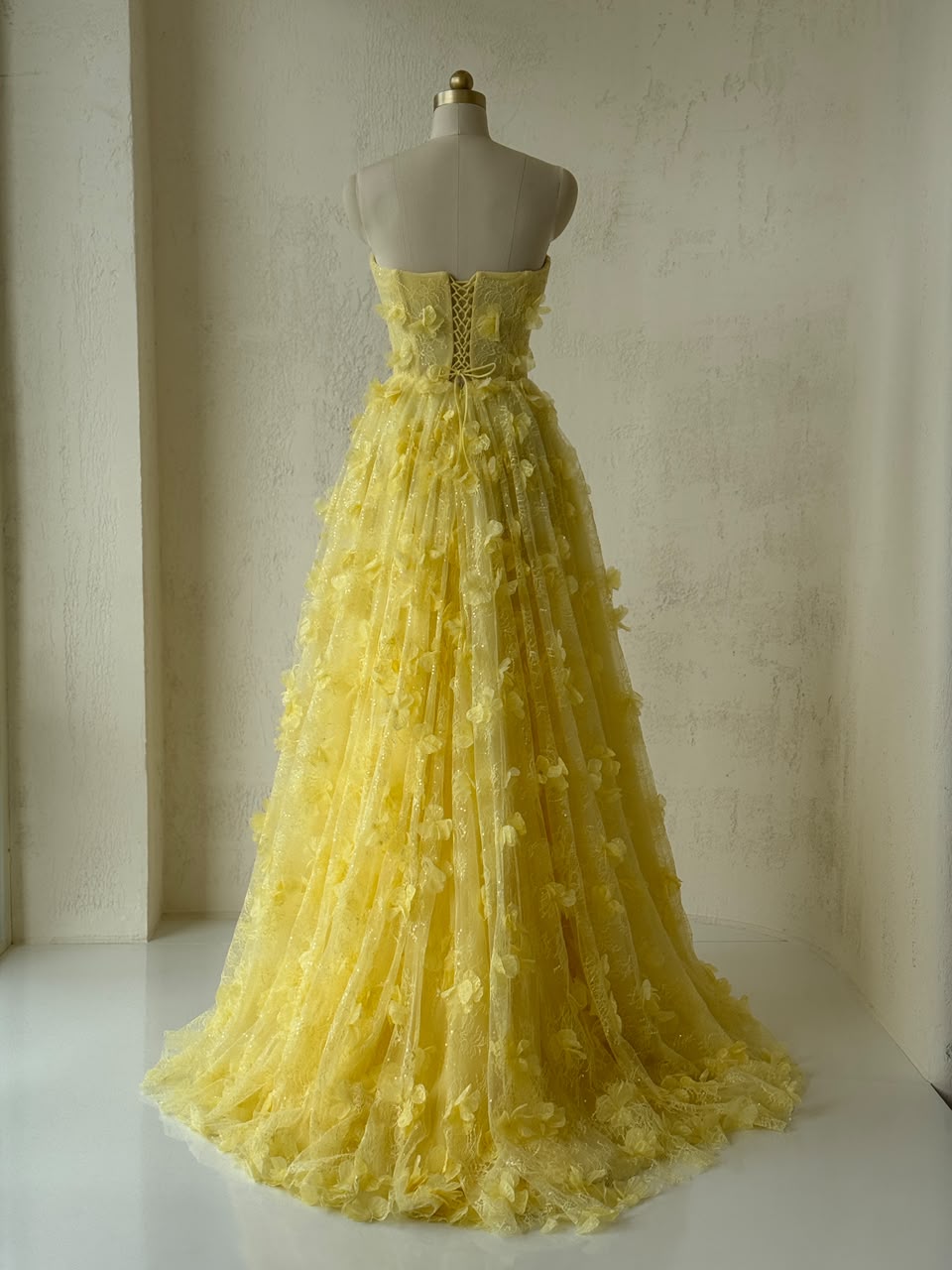 Yellow A-Line gown with embroidery and no sleeves