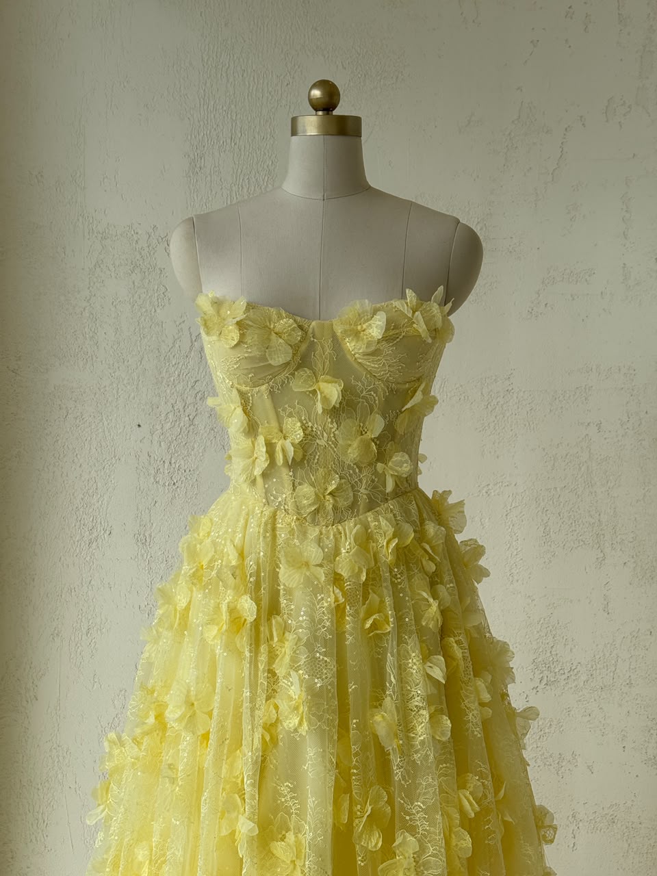 Yellow A-Line gown with embroidery and no sleeves