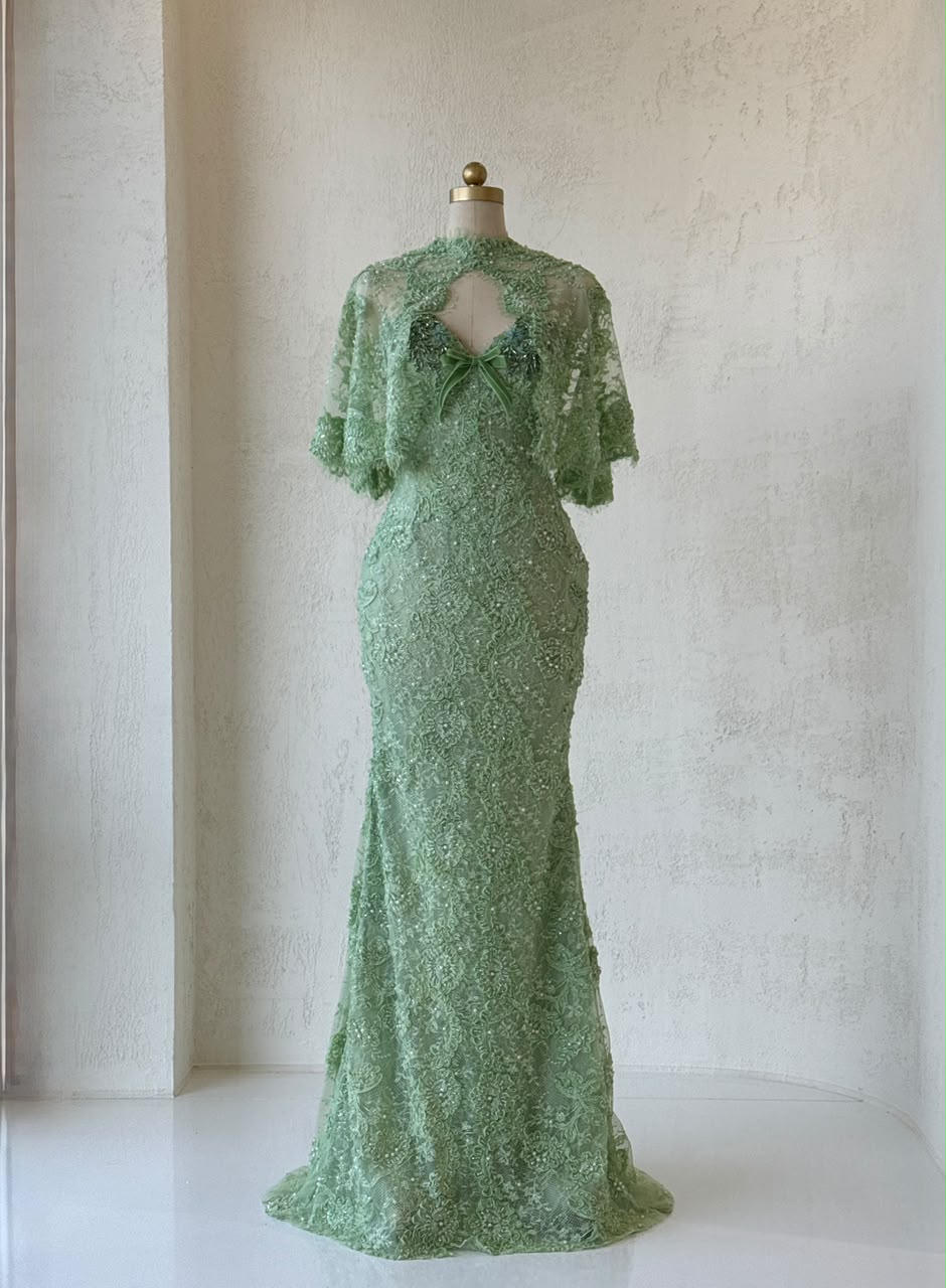 Green mermaid gown with embroidery, beading, lace, bolero and bow