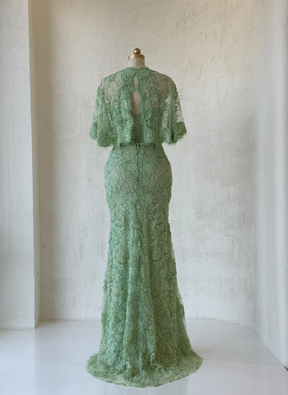 Green mermaid gown with embroidery, beading, lace, bolero and bow