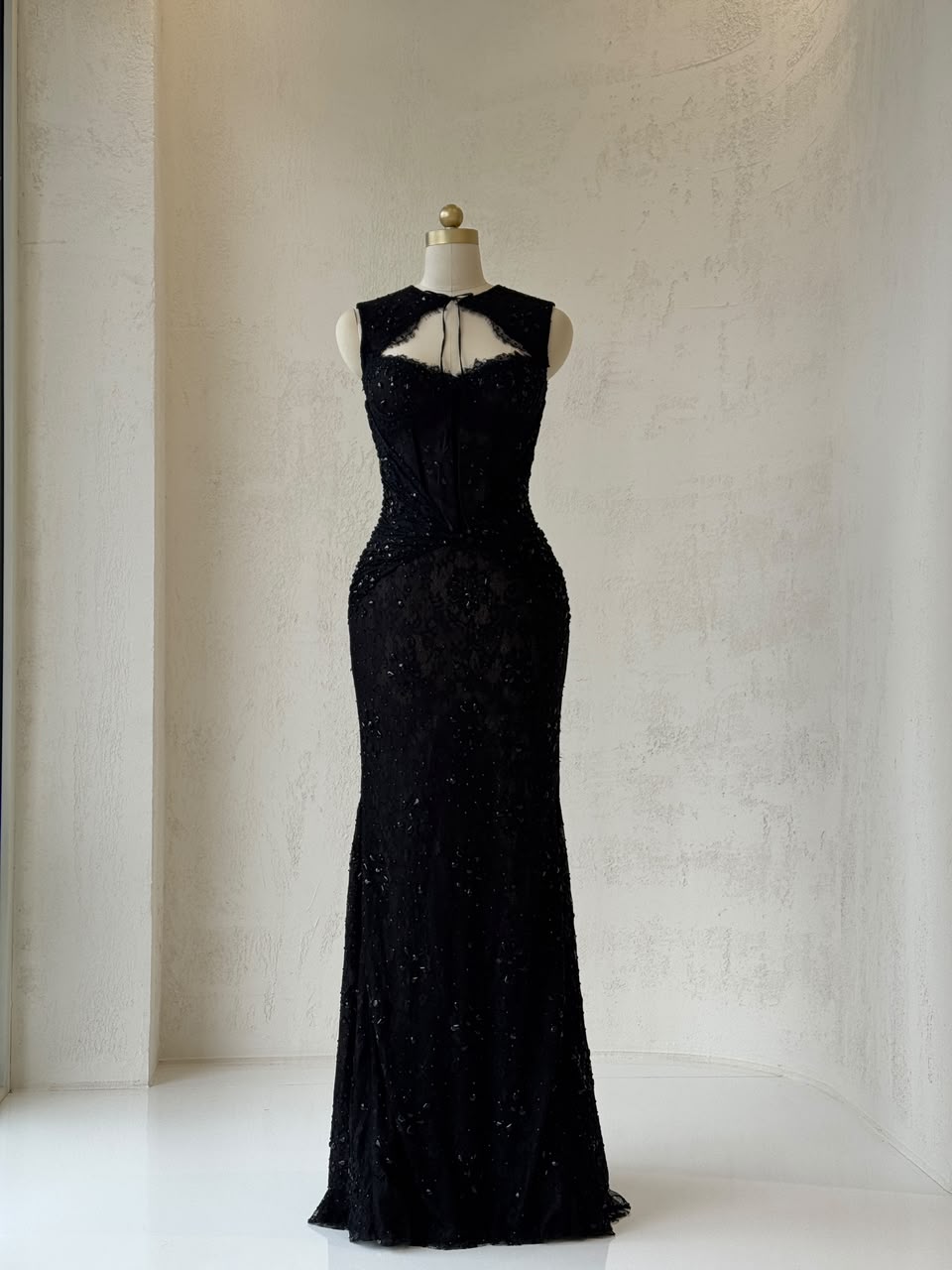 Black mermaid gown with straps, lace and embroidery