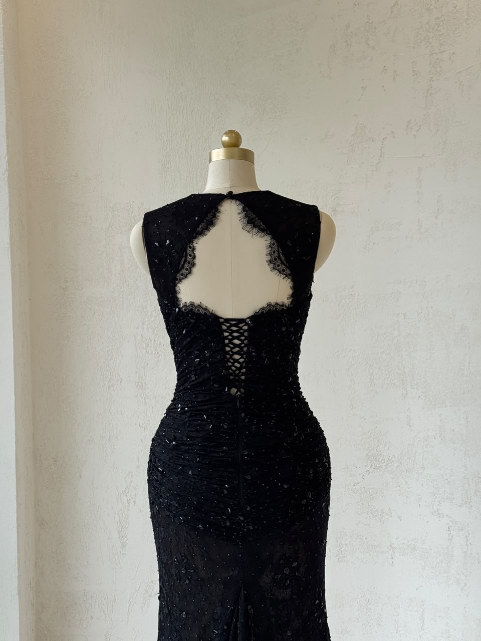 Black mermaid gown with straps, lace and embroidery