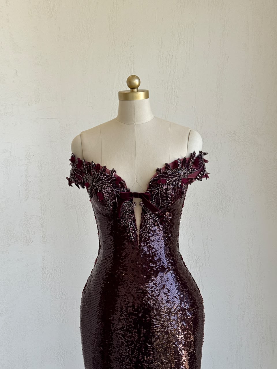 Red mermaid gown wth v-neck, embroidery, sequins and off the shoulder straps