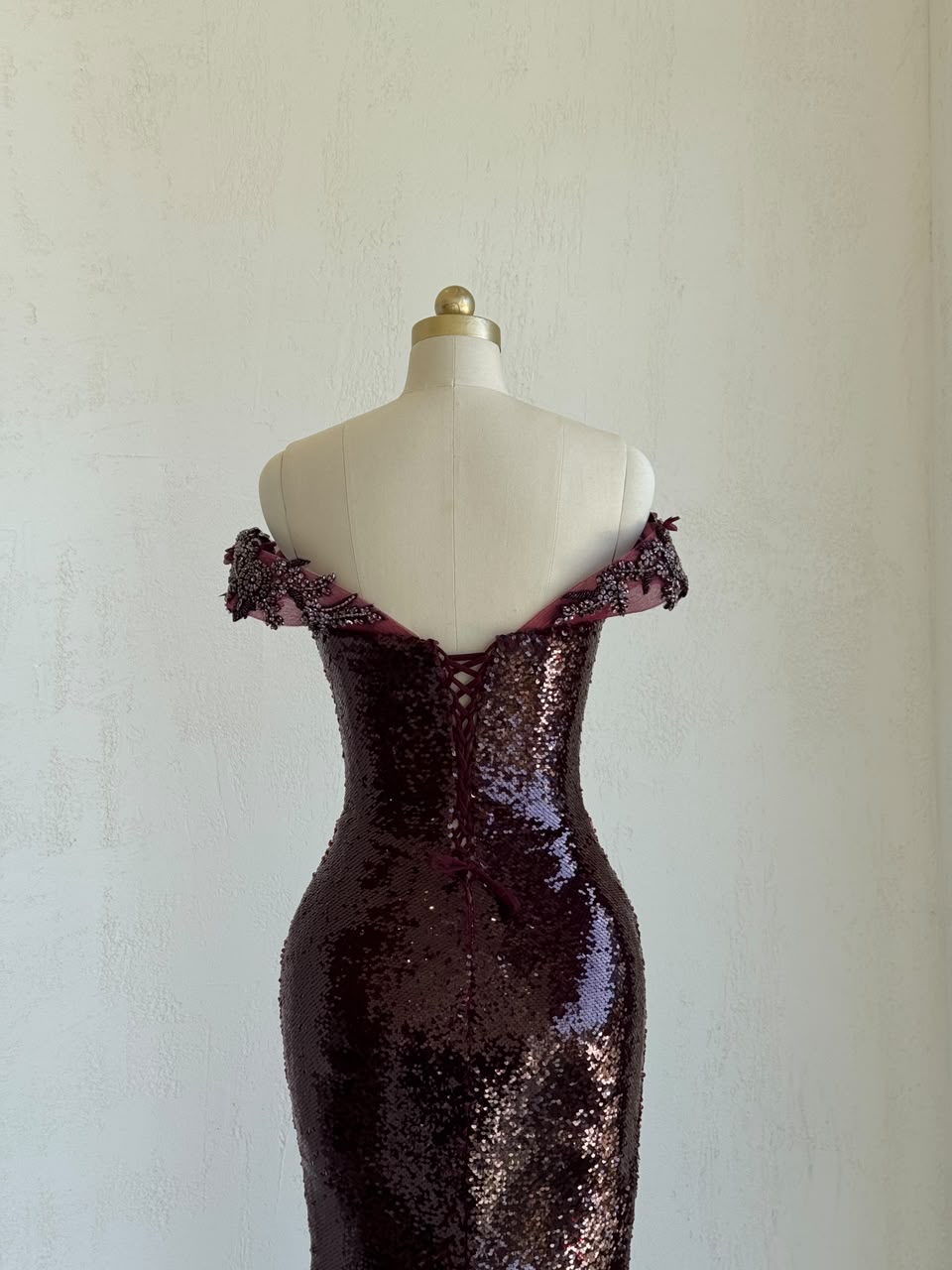 Red mermaid gown wth v-neck, embroidery, sequins and off the shoulder straps