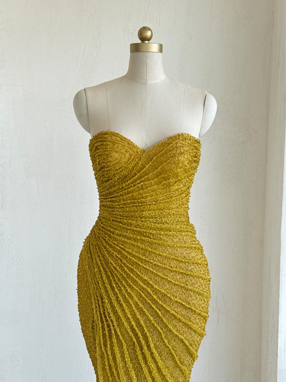Yellow mermaid gown with no sleeves