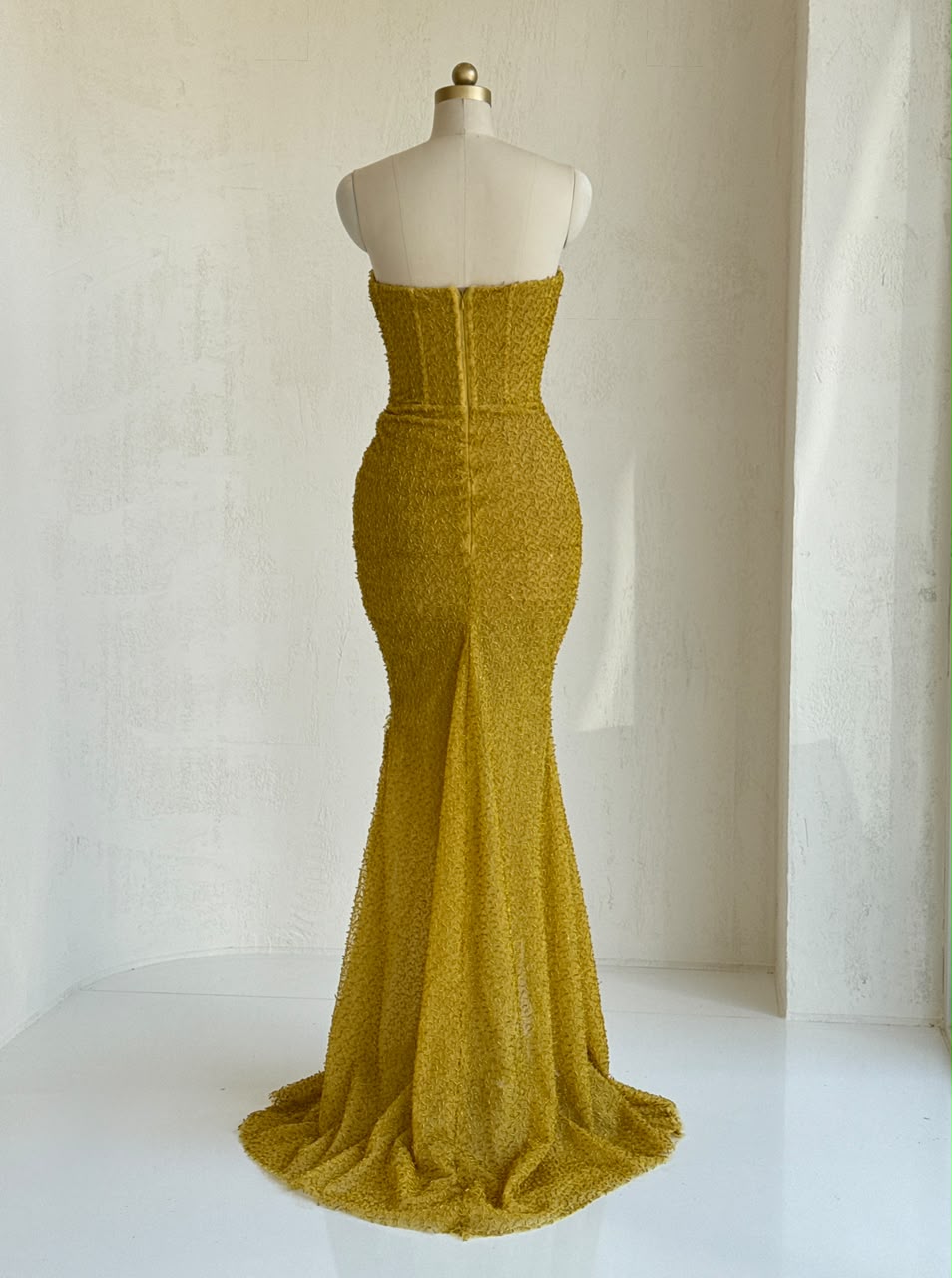 Yellow mermaid gown with no sleeves