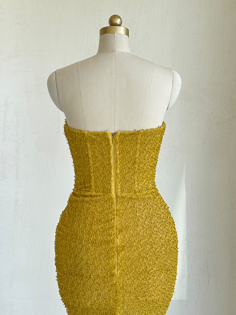 Yellow mermaid gown with no sleeves