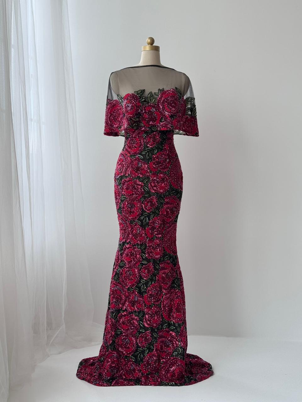 Red mermaid gown with embroidery and sheer overlay