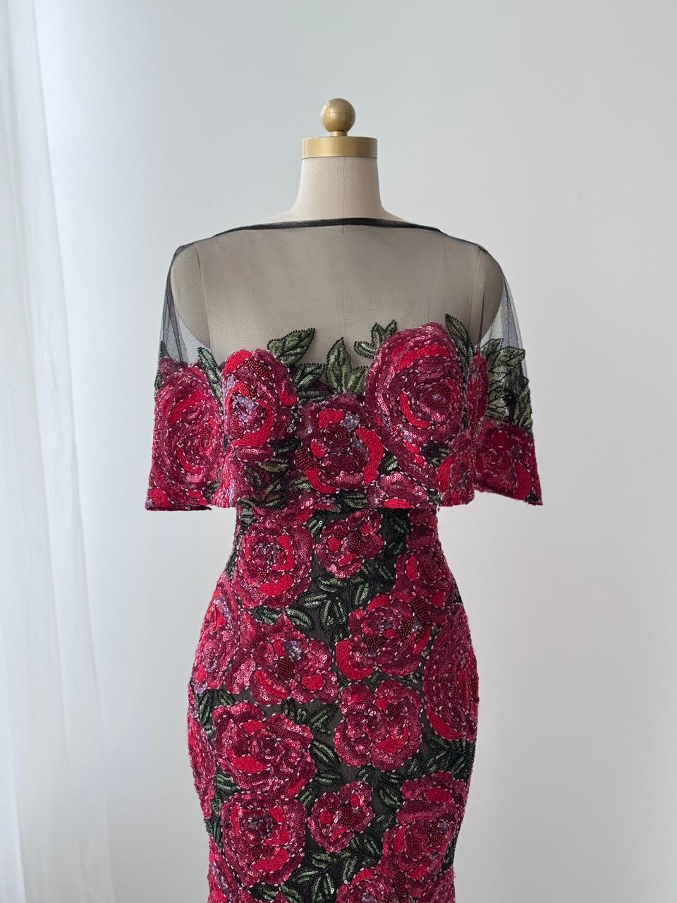 Red mermaid gown with embroidery and sheer overlay