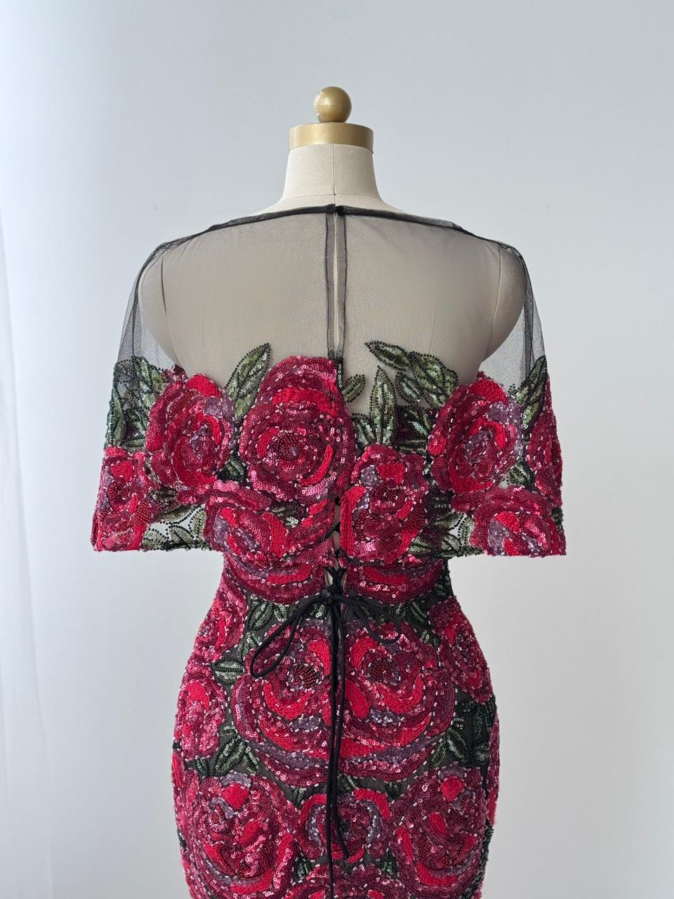 Red mermaid gown with embroidery and sheer overlay