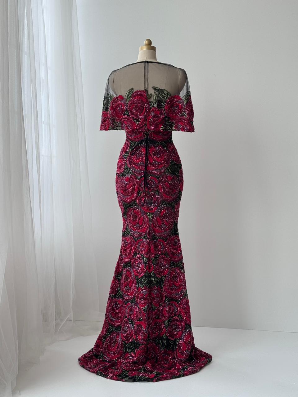 Red mermaid gown with embroidery and sheer overlay