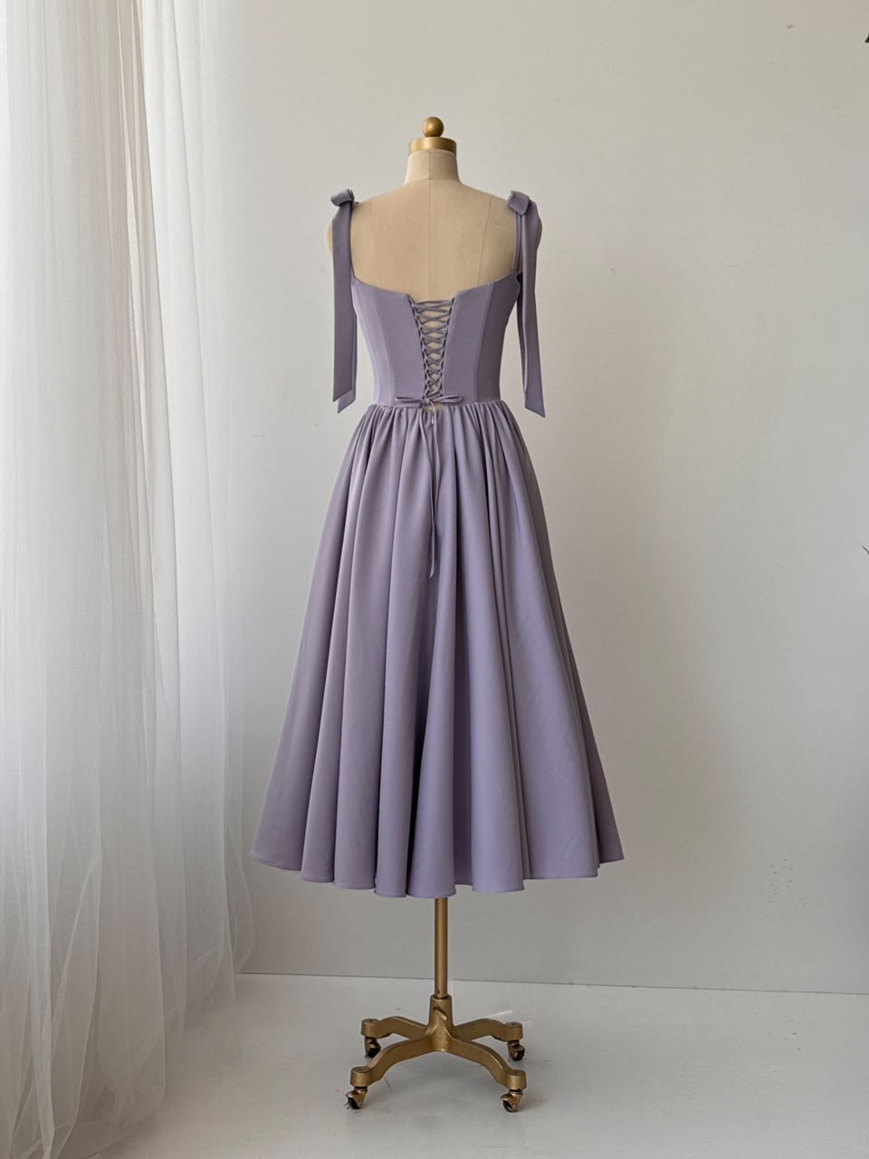 Purple midi dress with bow straps and embroidered lace