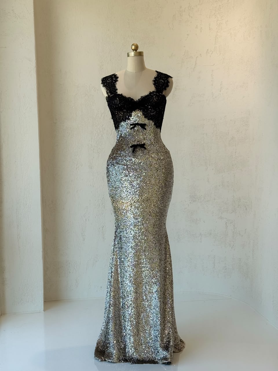 Black and grey mermaid gown with lace, sequins, embroidered bows and straps