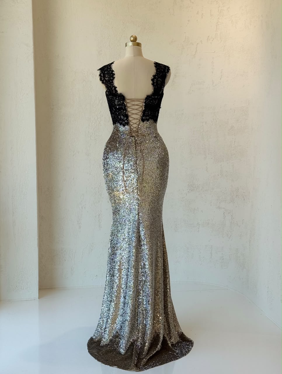 Black and grey mermaid gown with lace, sequins, embroidered bows and straps