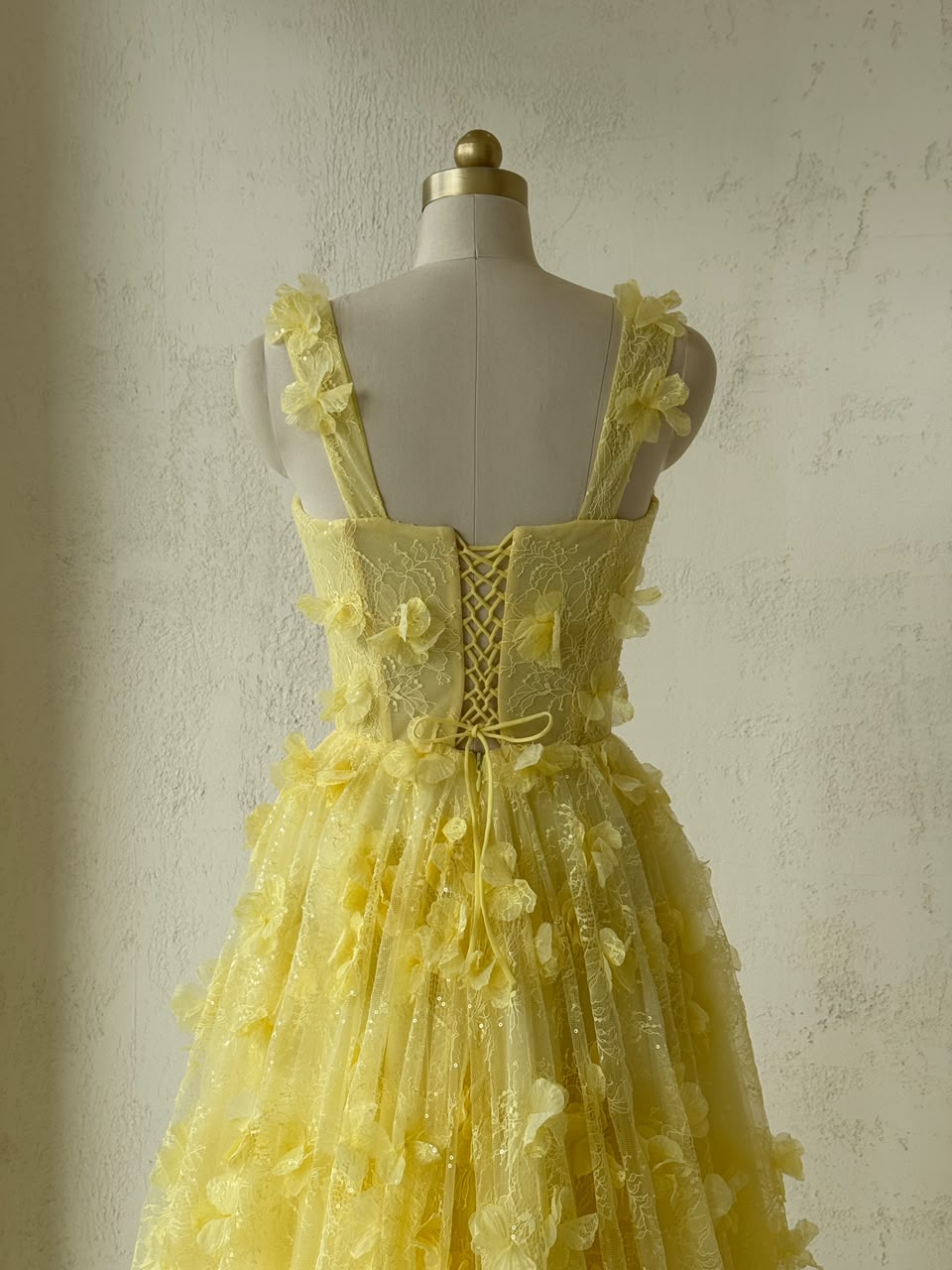 Yellow A-Line gown with spaghetti straps and embroidery