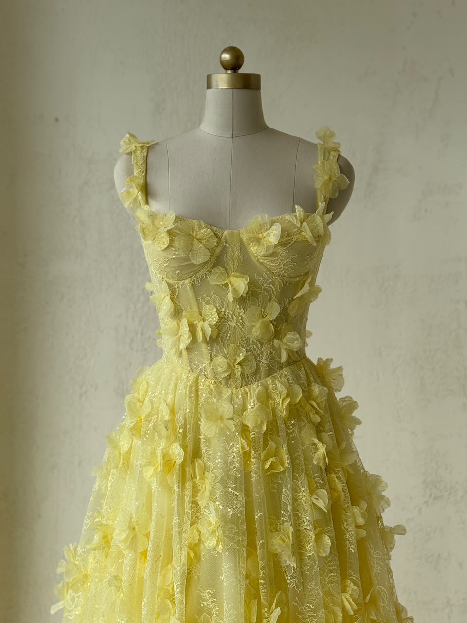 Yellow A-Line gown with spaghetti straps and embroidery