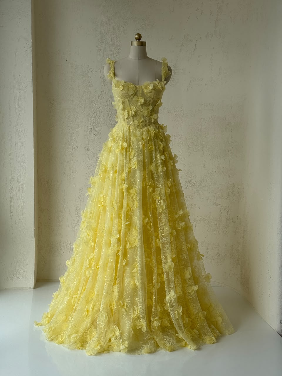 Yellow A-Line gown with spaghetti straps and embroidery
