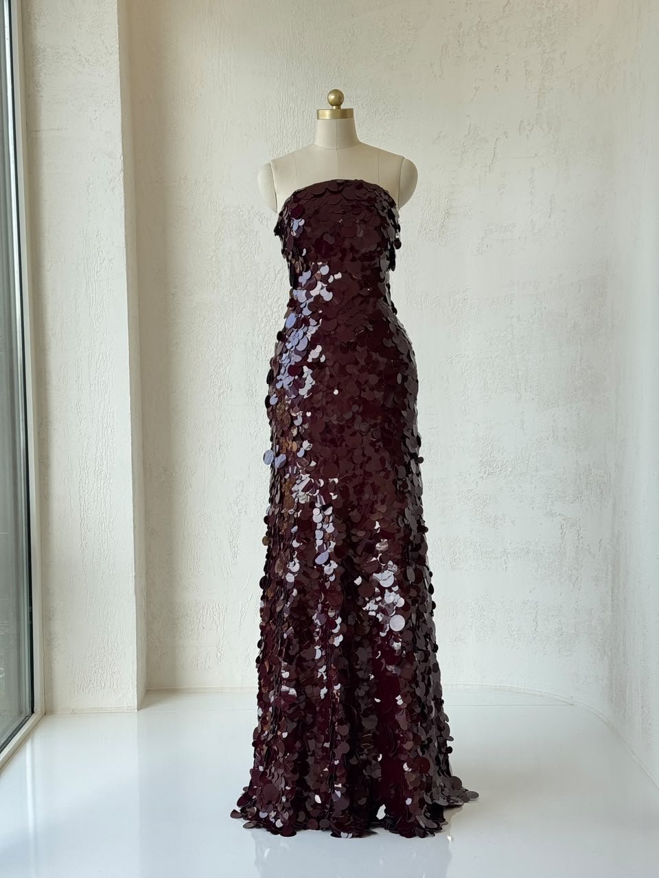 Red mermaid gown with sequins and no sleeves