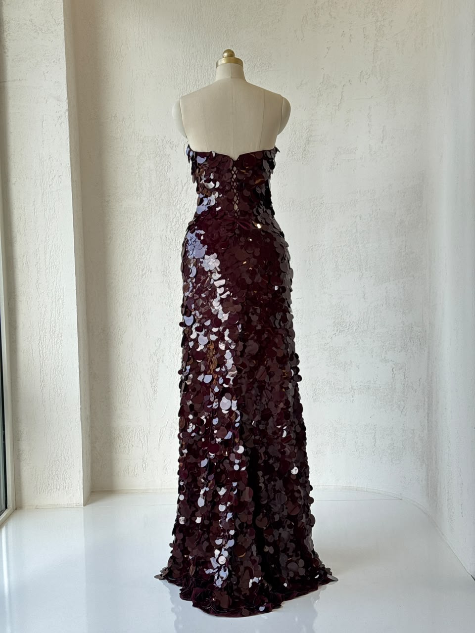 Red mermaid gown with sequins and no sleeves