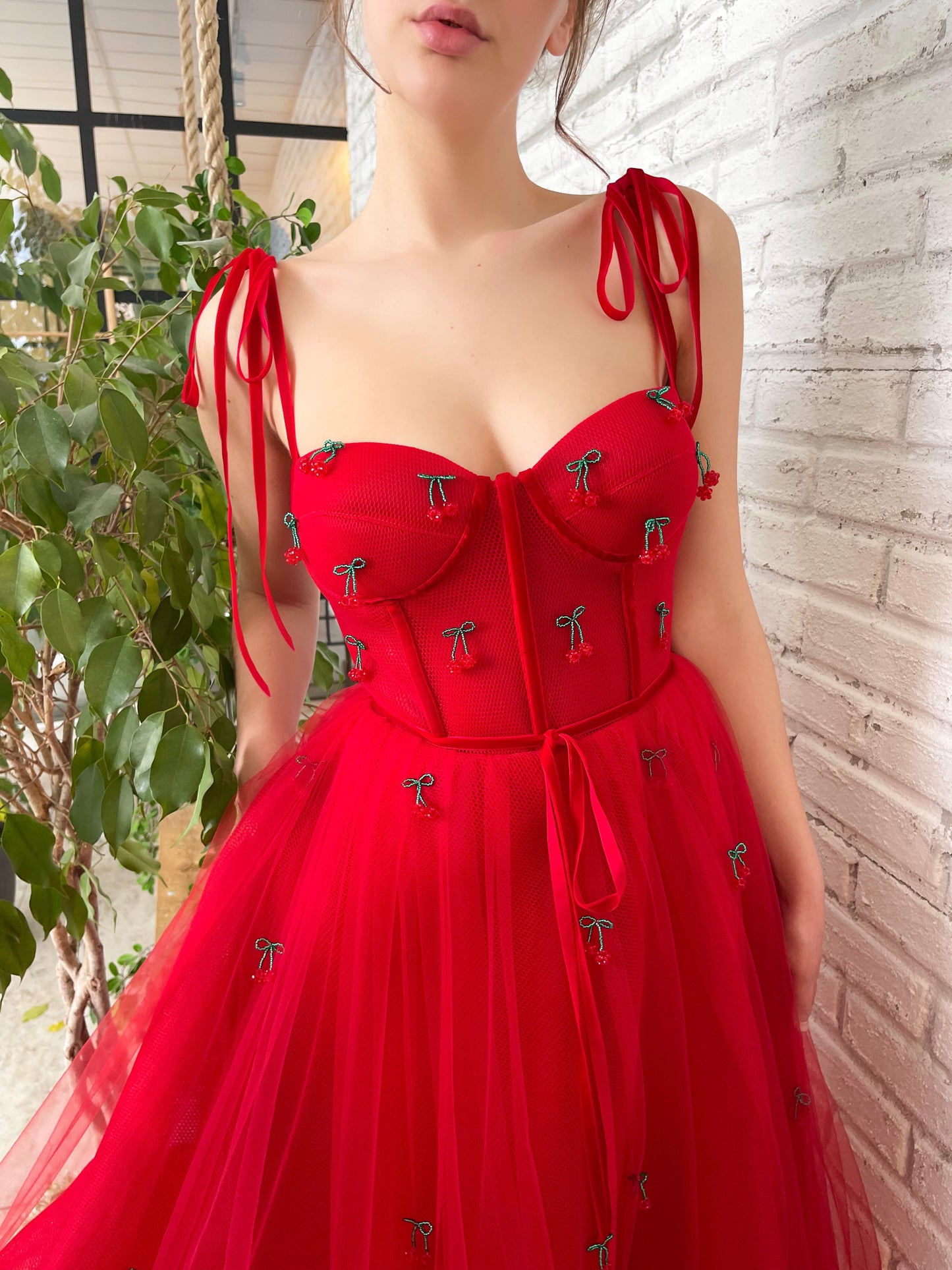 Red midi dress with embroidered cherries and straps