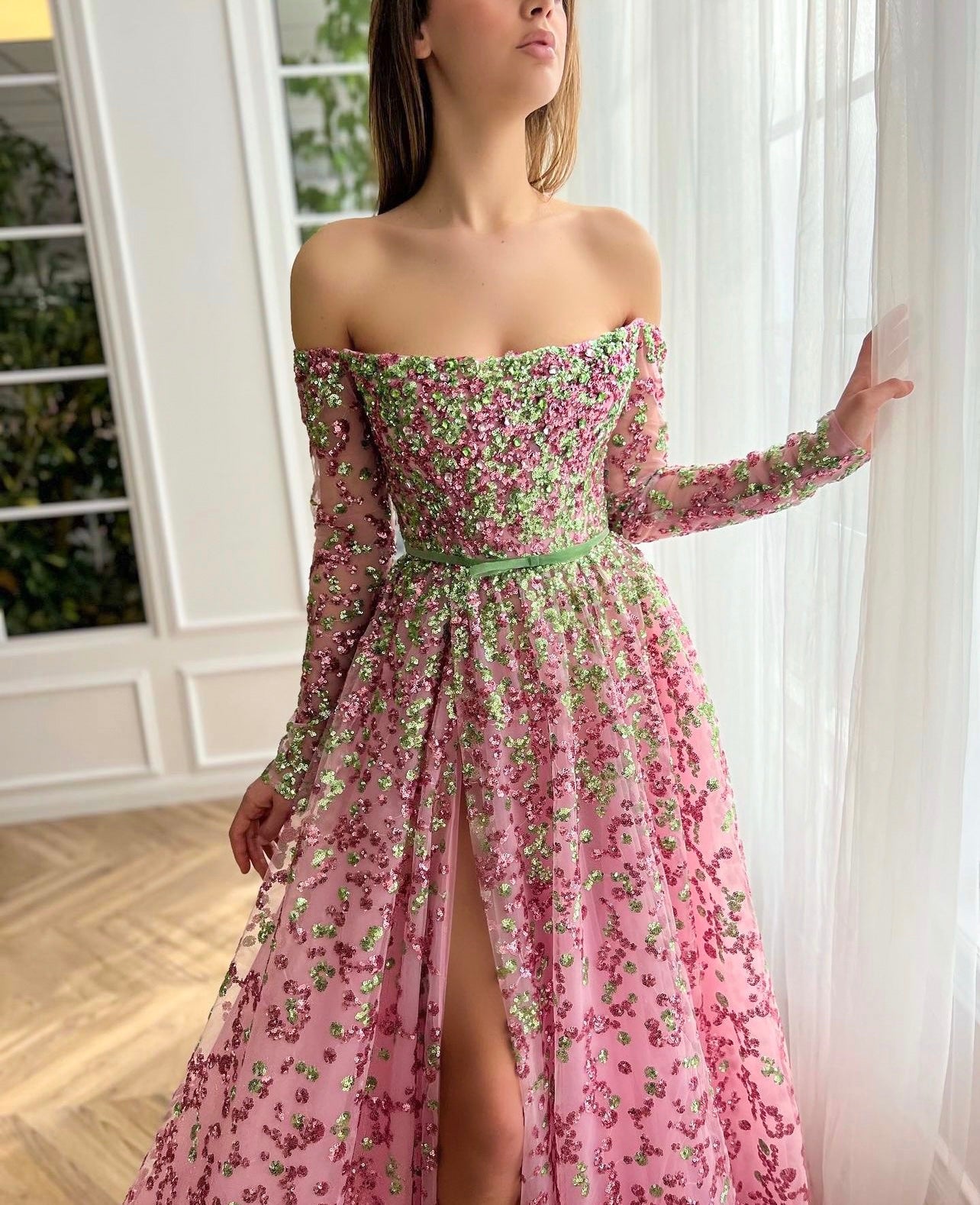 Pink A-Line dress with long off the shoulder sleeves and embroidery