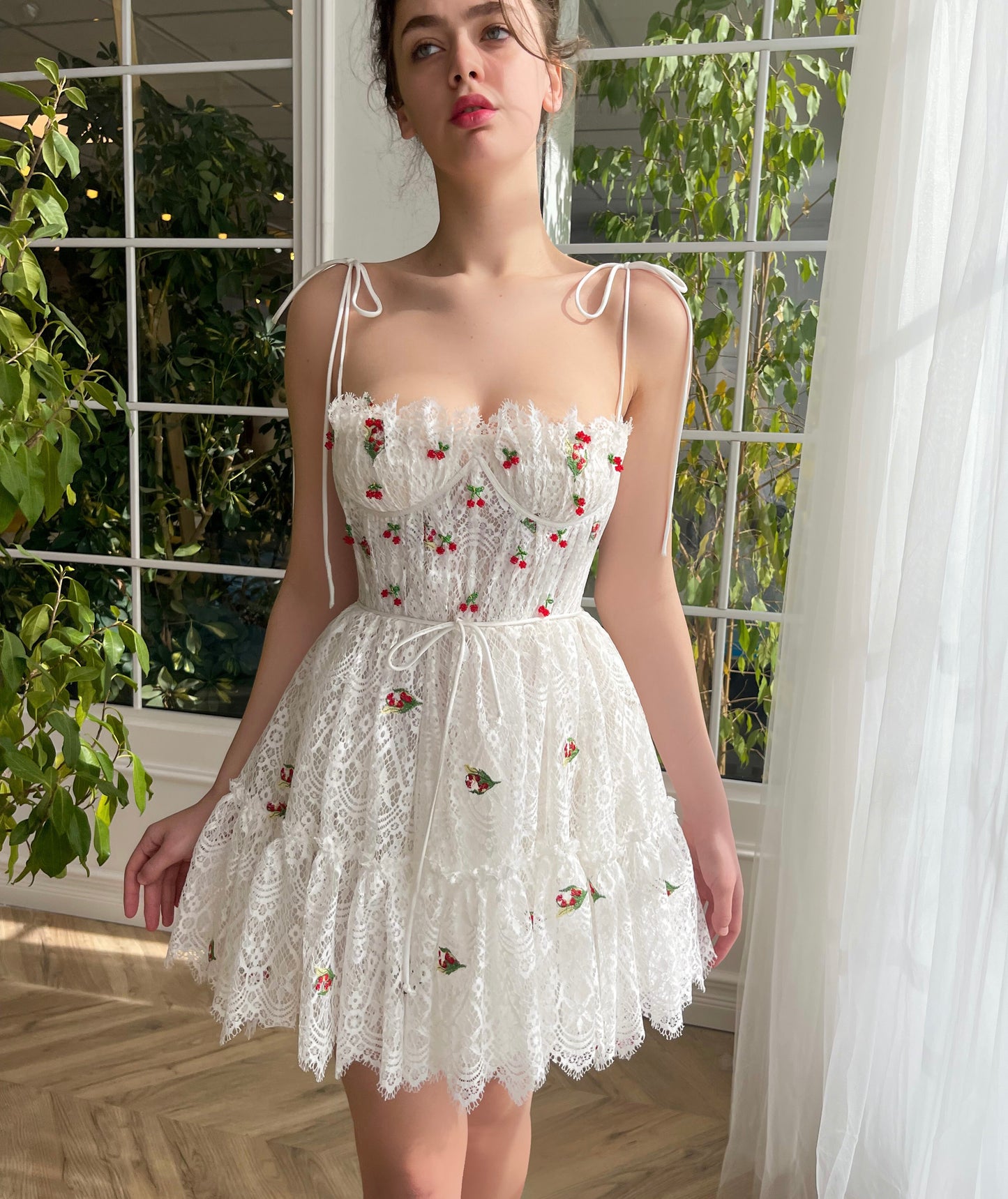 White mini dress with spaghetti straps and embroidered cherries