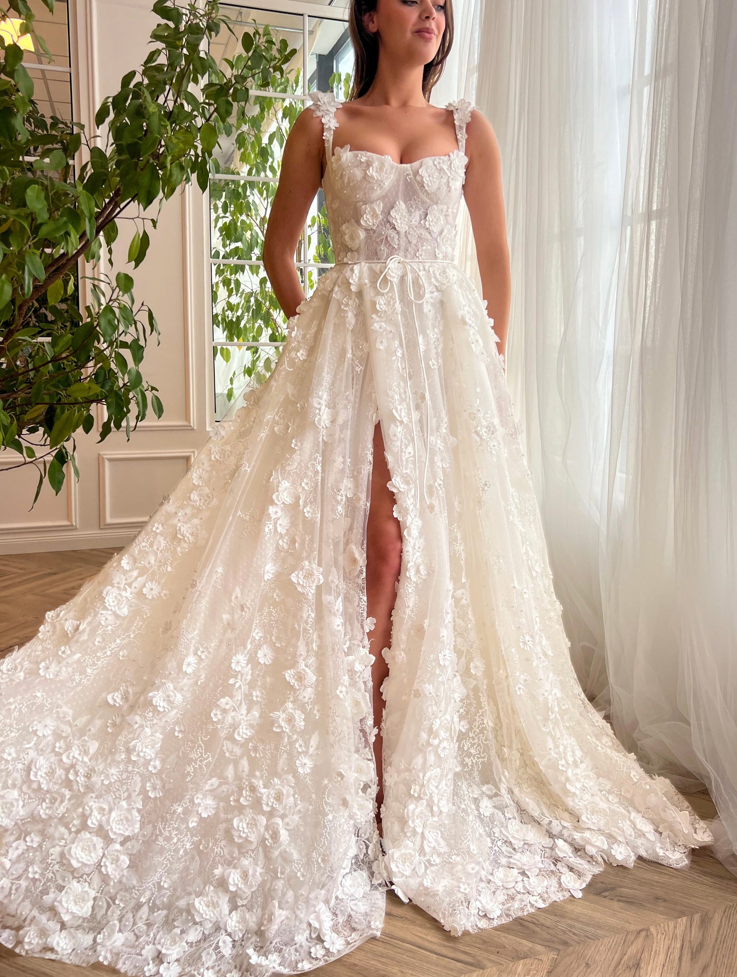 White A-Line bridal dress with straps, flowers and embroidery