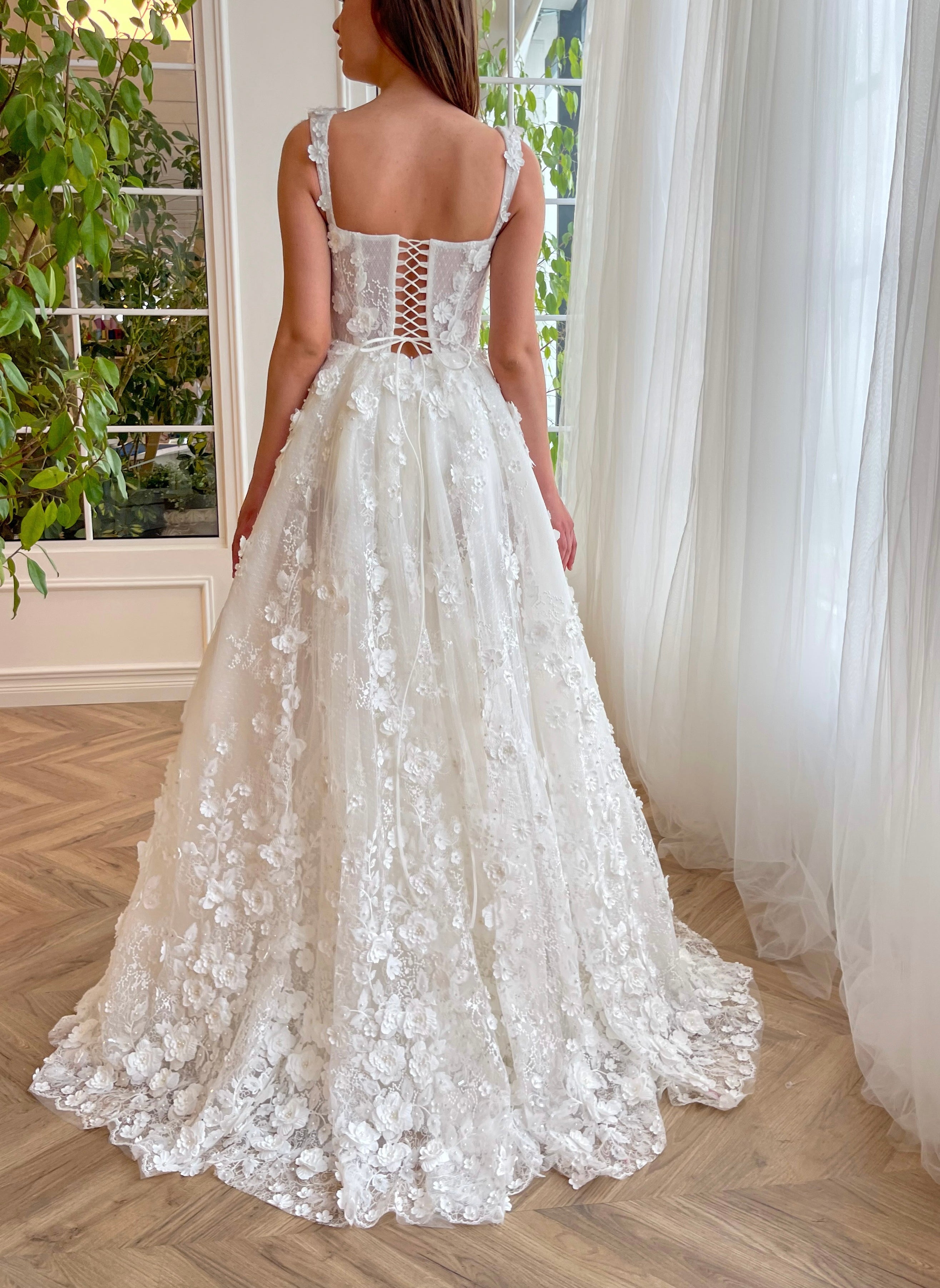 White A-Line bridal dress with straps, flowers and embroidery
