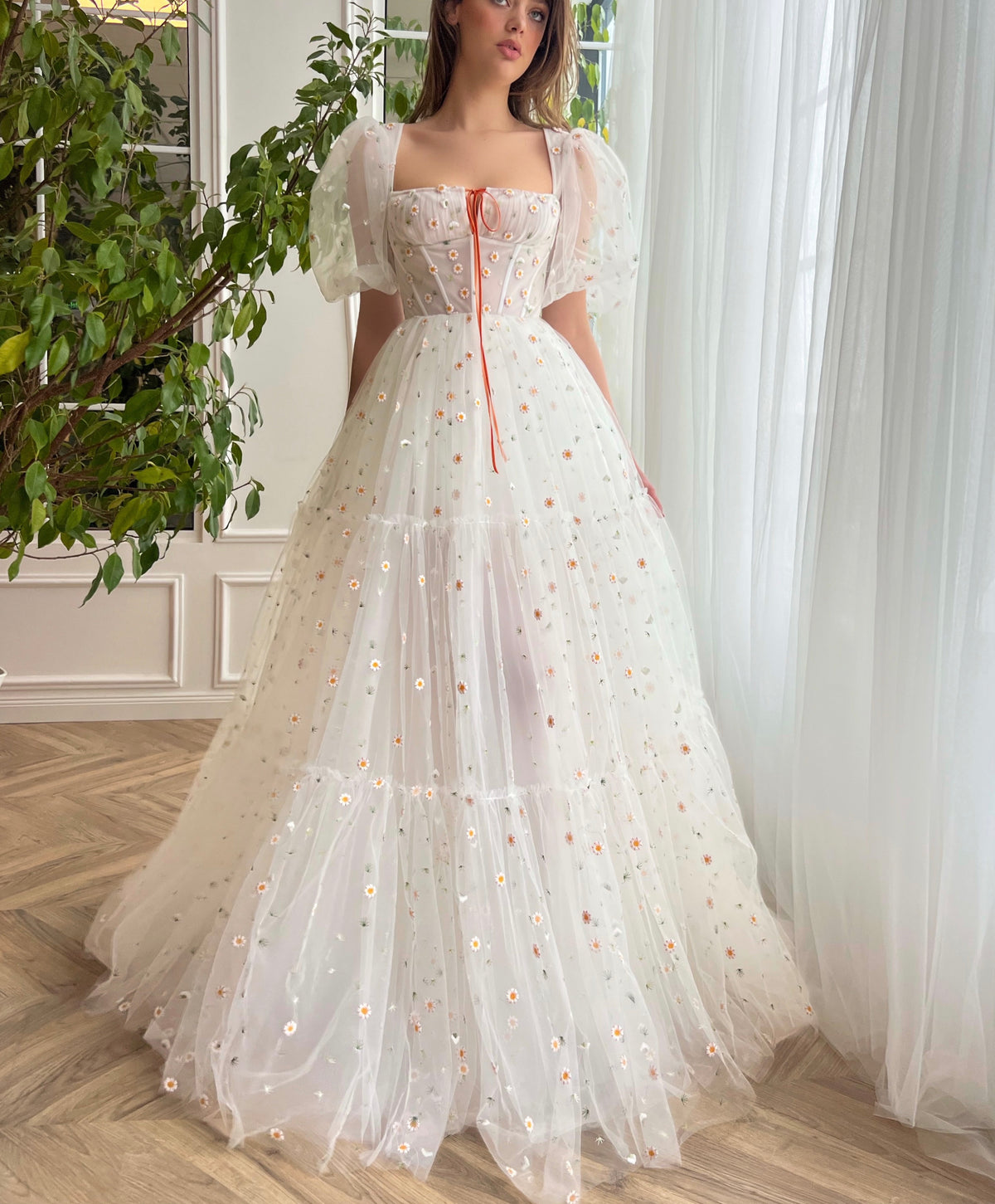 White A-Line bridal dress with short sleeves and embroidered daisies