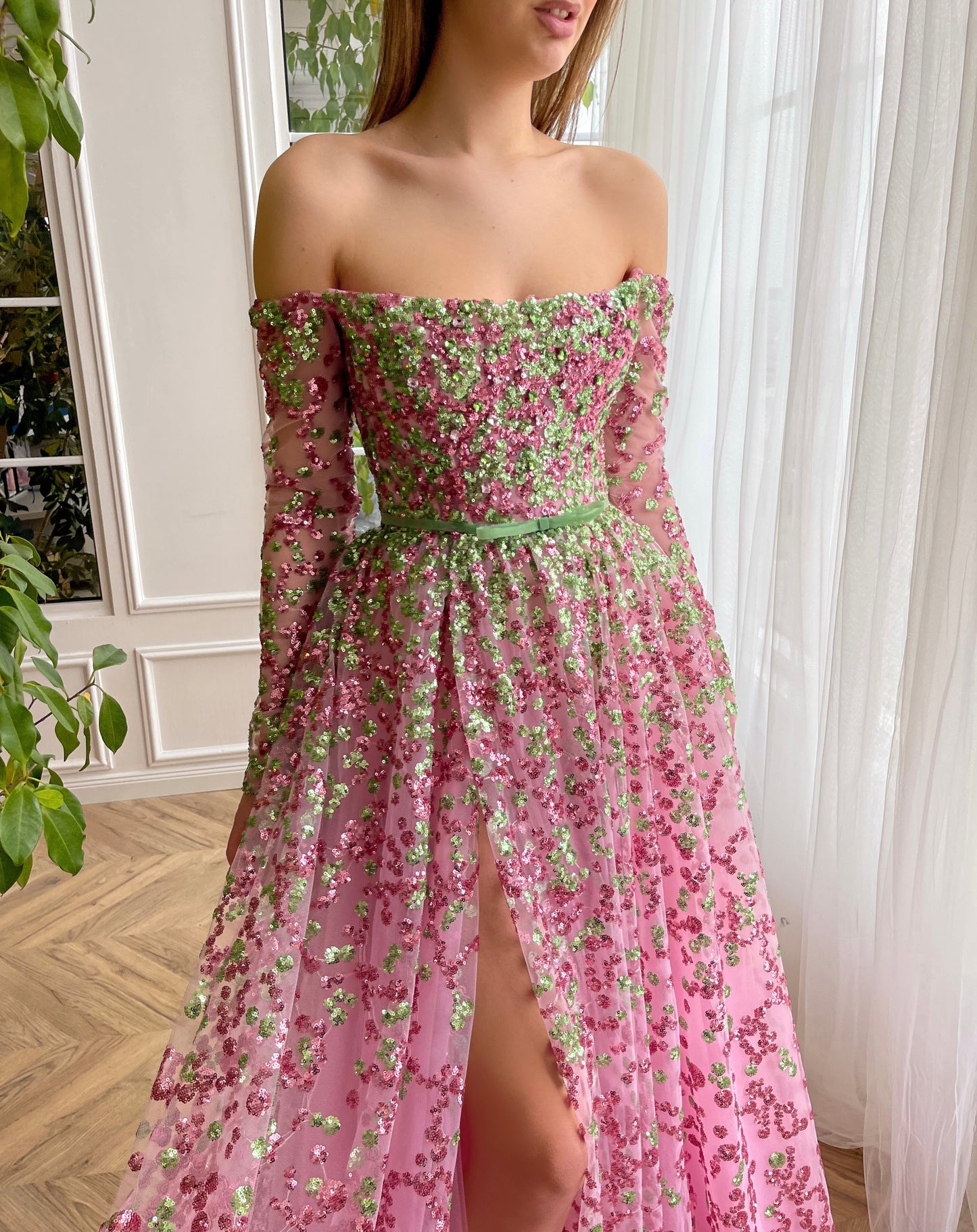 Pink A-Line dress with long off the shoulder sleeves and embroidery