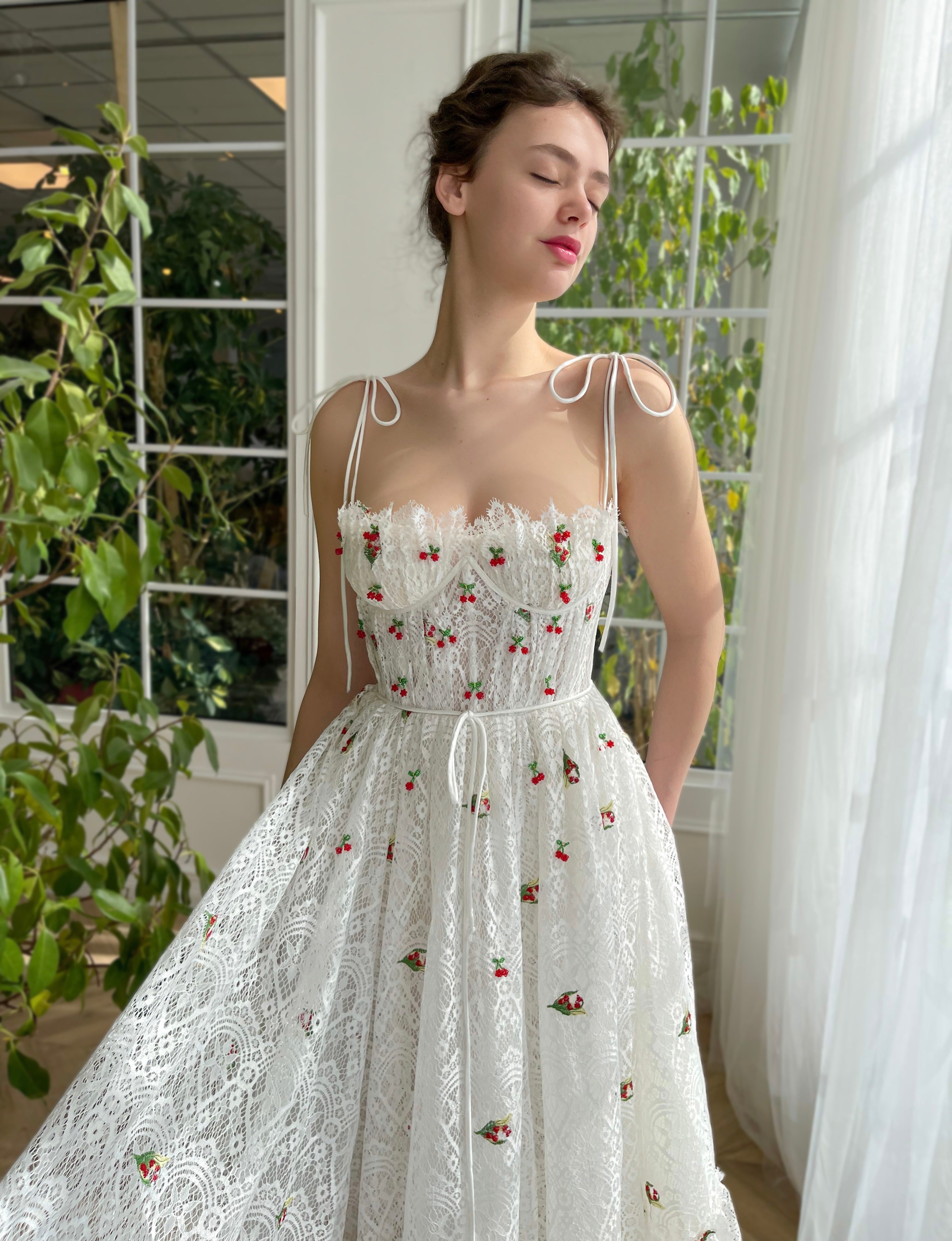White midi bridal dress with spaghetti straps and embroidered cherries