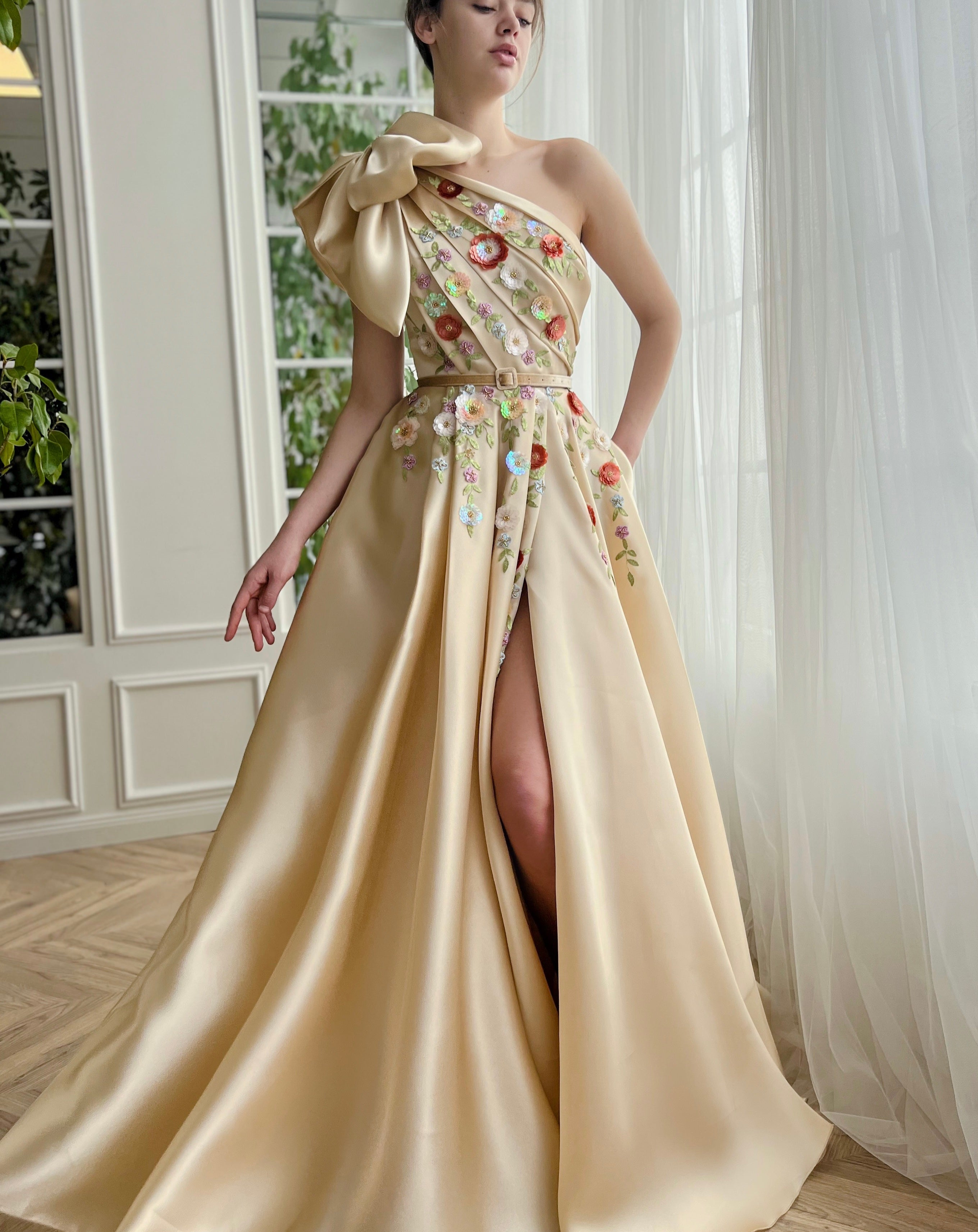 Beige A-Line dress with one shoulder sleeve, belt and embroidery