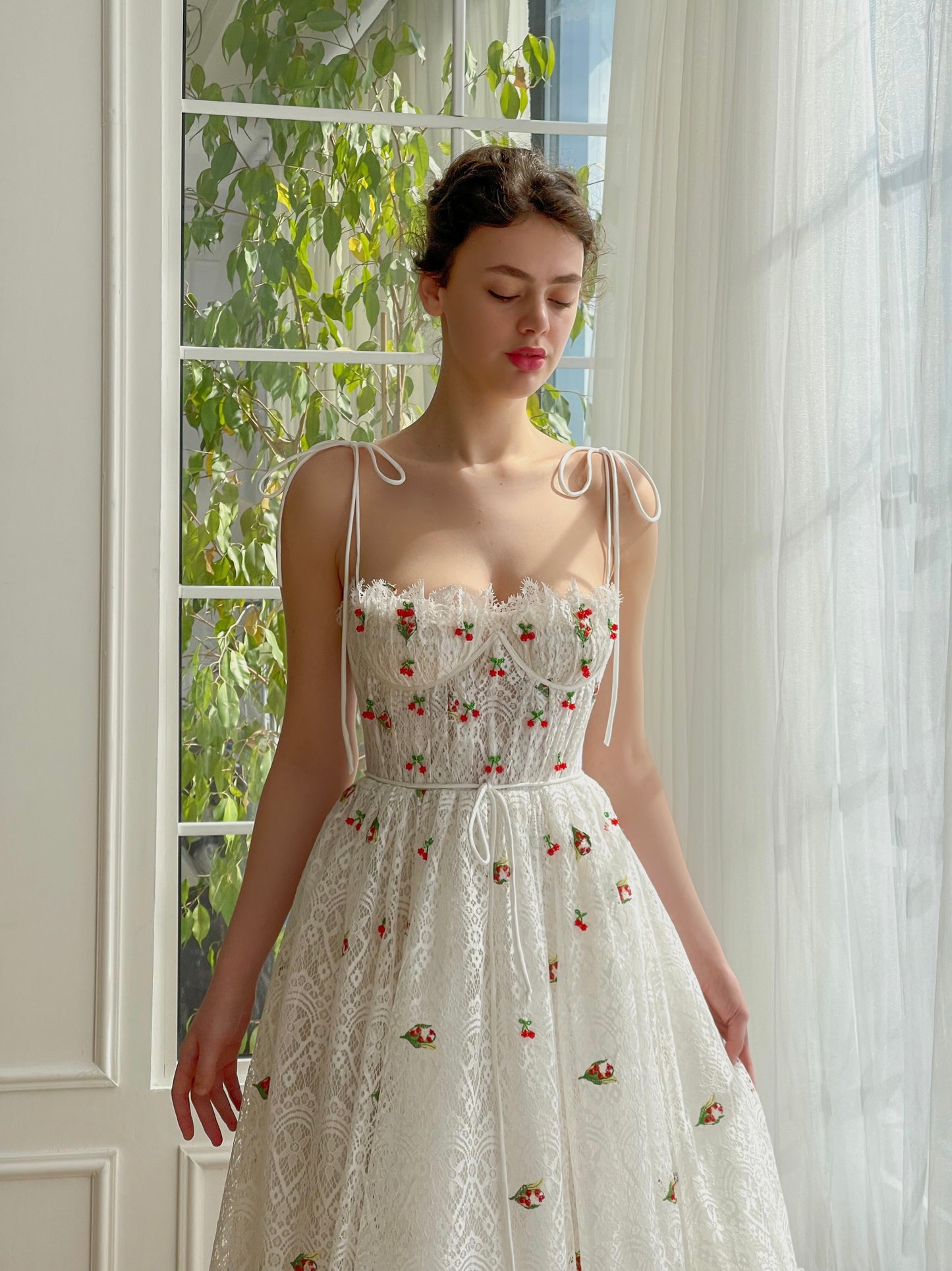 White midi bridal dress with spaghetti straps and embroidered cherries