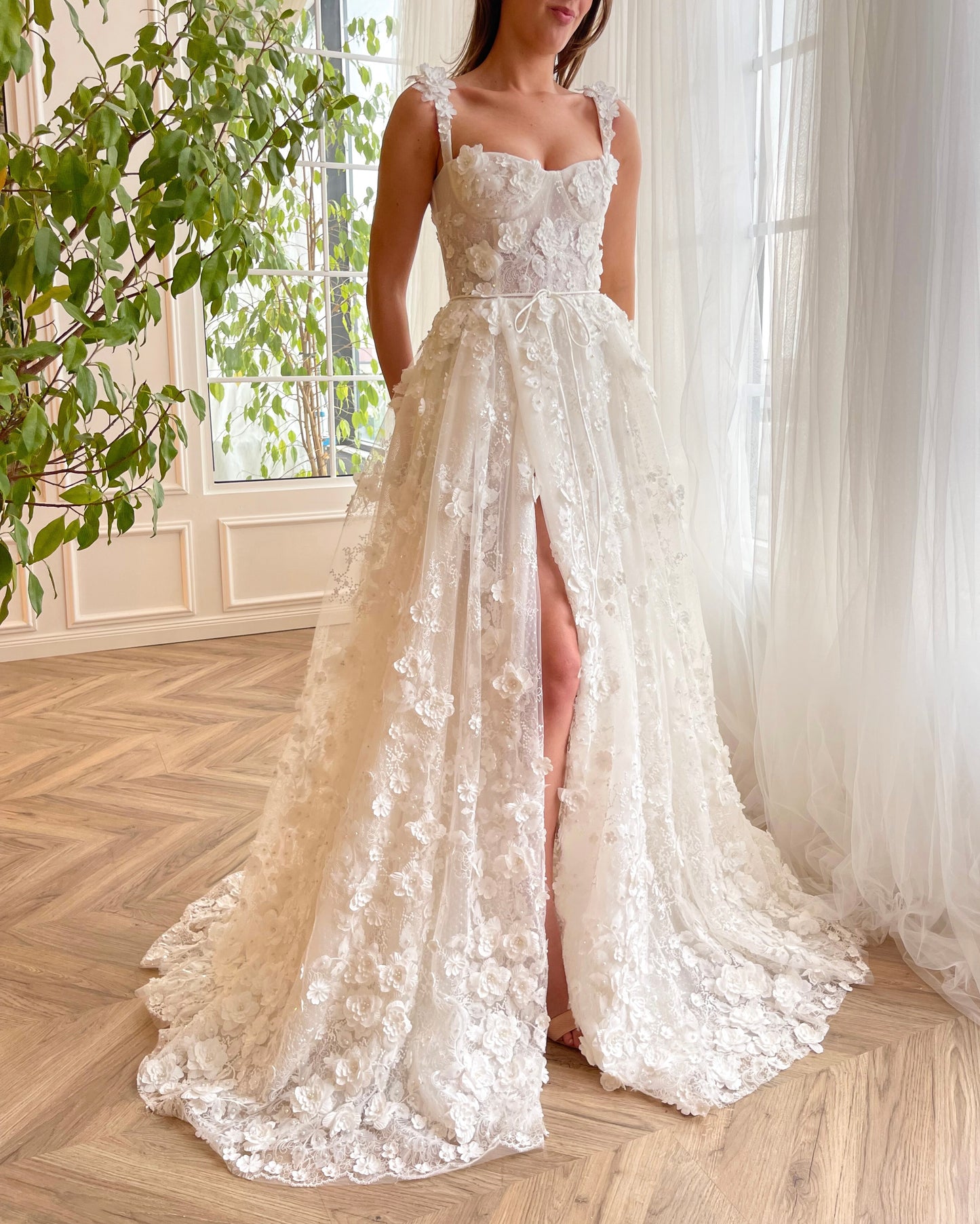 White A-Line bridal dress with straps, flowers and embroidery