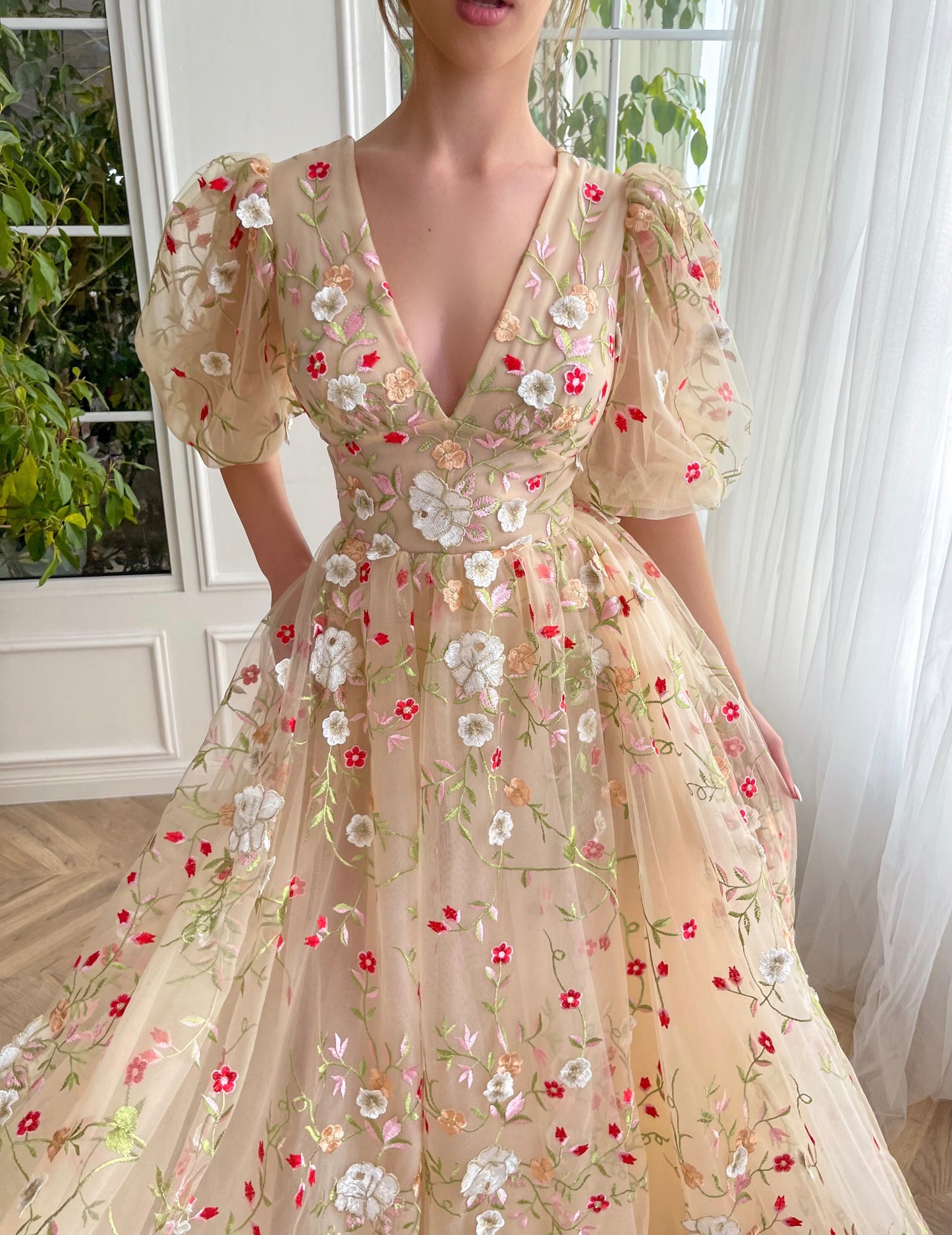 Beige A-Line dress with v-neck, short sleeves and embroidery