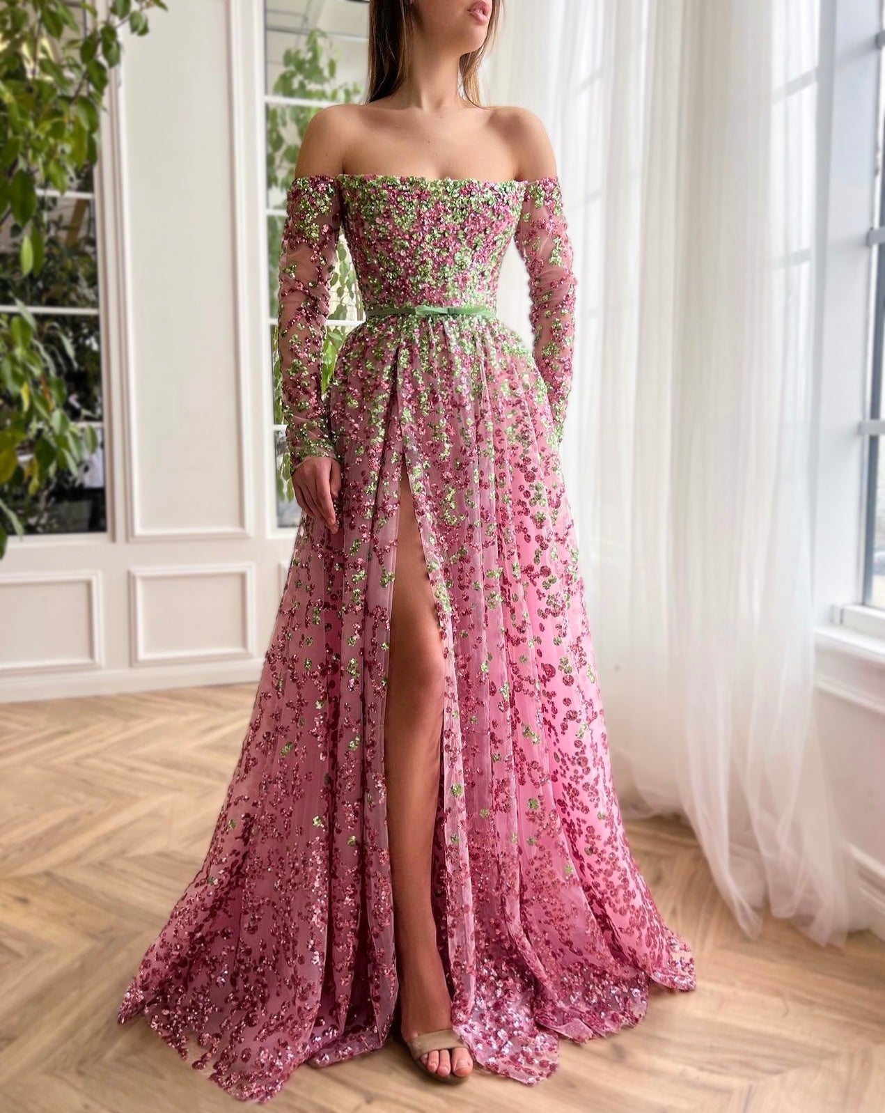Pink A-Line dress with long off the shoulder sleeves and embroidery